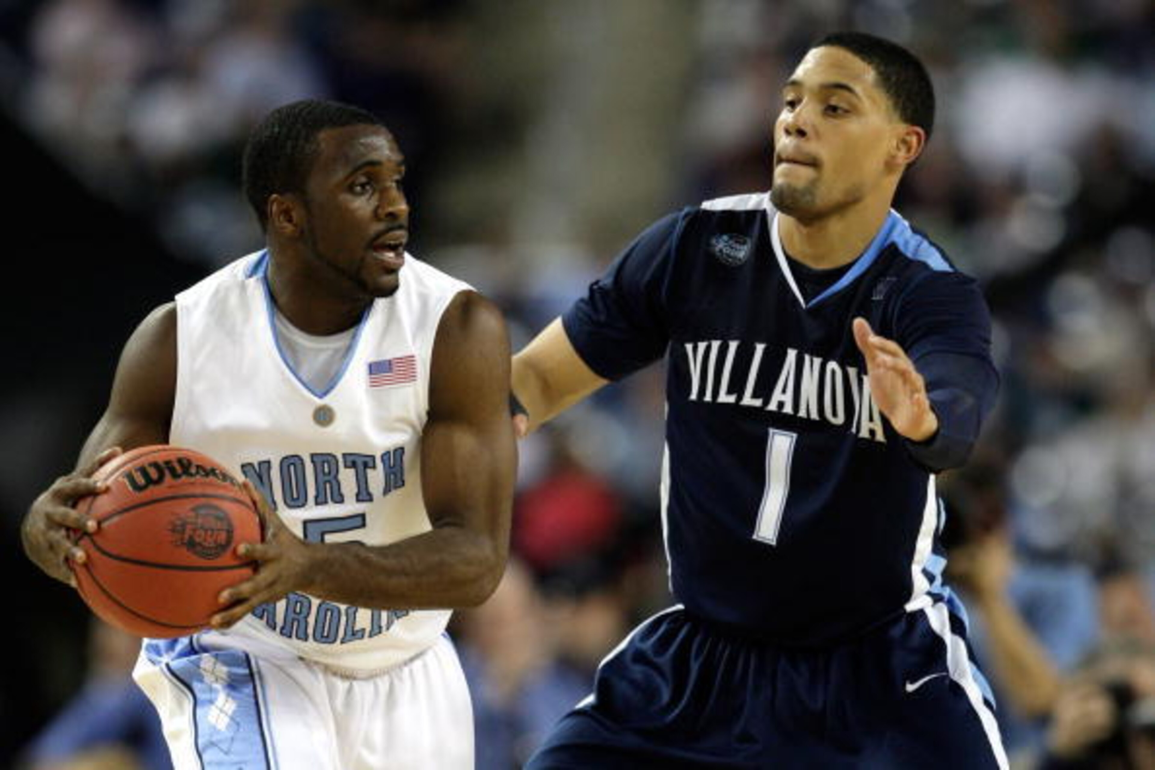 DETROIT - APRIL 04: Ty Lawson #5 of the North Carolina Tar Heels looks to pass the ball against Scottie Reynolds #1 of the Villanova Wildcats during the National Semifinal game of the NCAA Division I Men's Basketball Championship at Ford Field on April DETROIT - APRIL 04: Ty Lawson #5 of the North Carolina Tar Heels looks to pass the ball against Scottie Reynolds #1 of the Villanova Wildcats during the National Semifinal game of the NCAA Division I Men's Basketball Championship at Ford Field on April