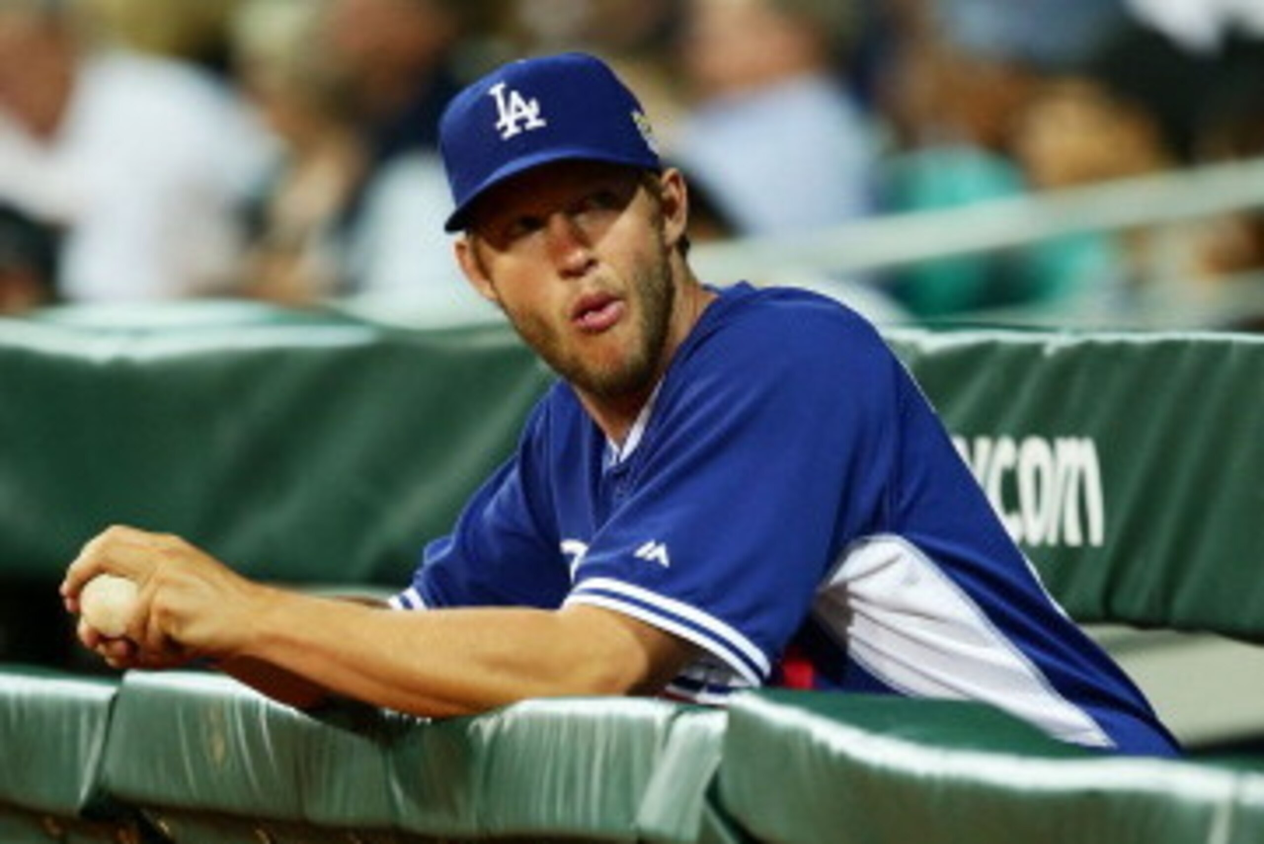 SYDNEY, AUSTRALIA - MARCH 20:  Clayton Kershaw of the Dodgers looks on from the dugout during the match between Team Australia and the LA Dodgers at Sydney Cricket Ground on March 20, 2014 in Sydney, Australia.  (Photo by Matt King/Getty Images)