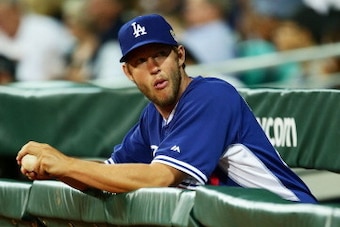 SYDNEY, AUSTRALIA - MARCH 20: Clayton Kershaw of the Dodgers looks on from the dugout during the match between Team Australia and the LA Dodgers at Sydney Cricket Ground on March 20, 2014 in Sydney, Australia. (Photo by Matt King/Getty Images) SYDNEY, AUSTRALIA - MARCH 20: Clayton Kershaw of the Dodgers looks on from the dugout during the match between Team Australia and the LA Dodgers at Sydney Cricket Ground on March 20, 2014 in Sydney, Australia. (Photo by Matt King/Getty Images)