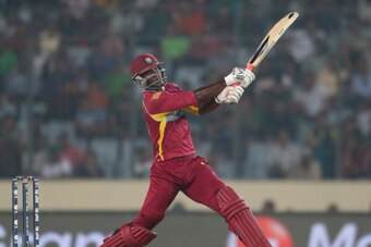 DHAKA, BANGLADESH - APRIL 01:  Darren Sammy of the West Indies hits a six during the ICC World Twenty20 Bangladesh 2014 match between West Indies and Pakistan at Sher-e-Bangla Mirpur Stadium on April 1, 2014 in Dhaka, Bangladesh.  (Photo by Scott Barbour/