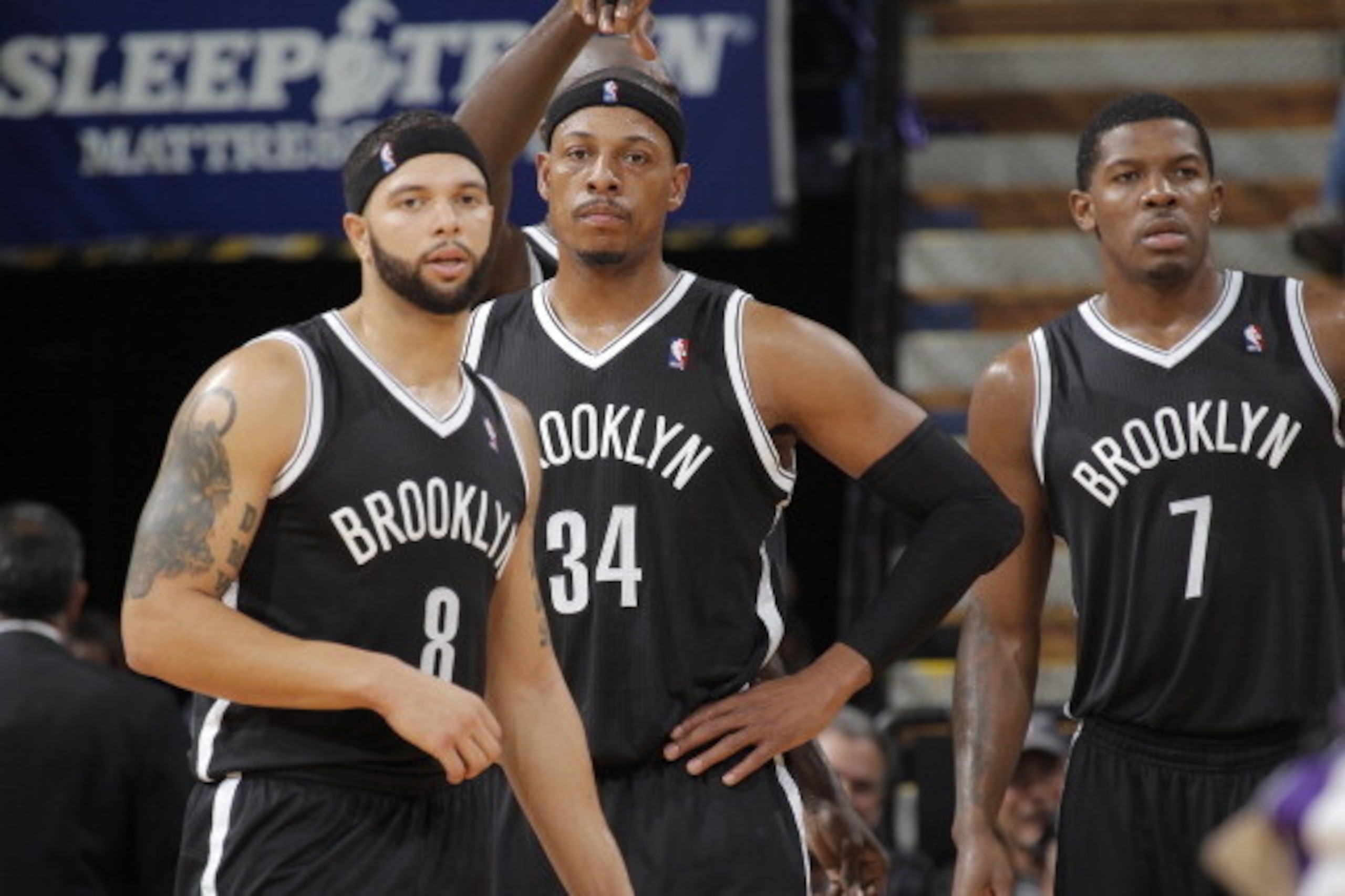 SACRAMENTO, CA - NOVEMBER 13: Deron Williams #8, Paul Pierce #34 and Joe Johnson #7 of the Brooklyn Nets in a game against the Sacramento Kings on November 13, 2013 at Sleep Train Arena in Sacramento, California. NOTE TO USER: User expressly acknowledges 