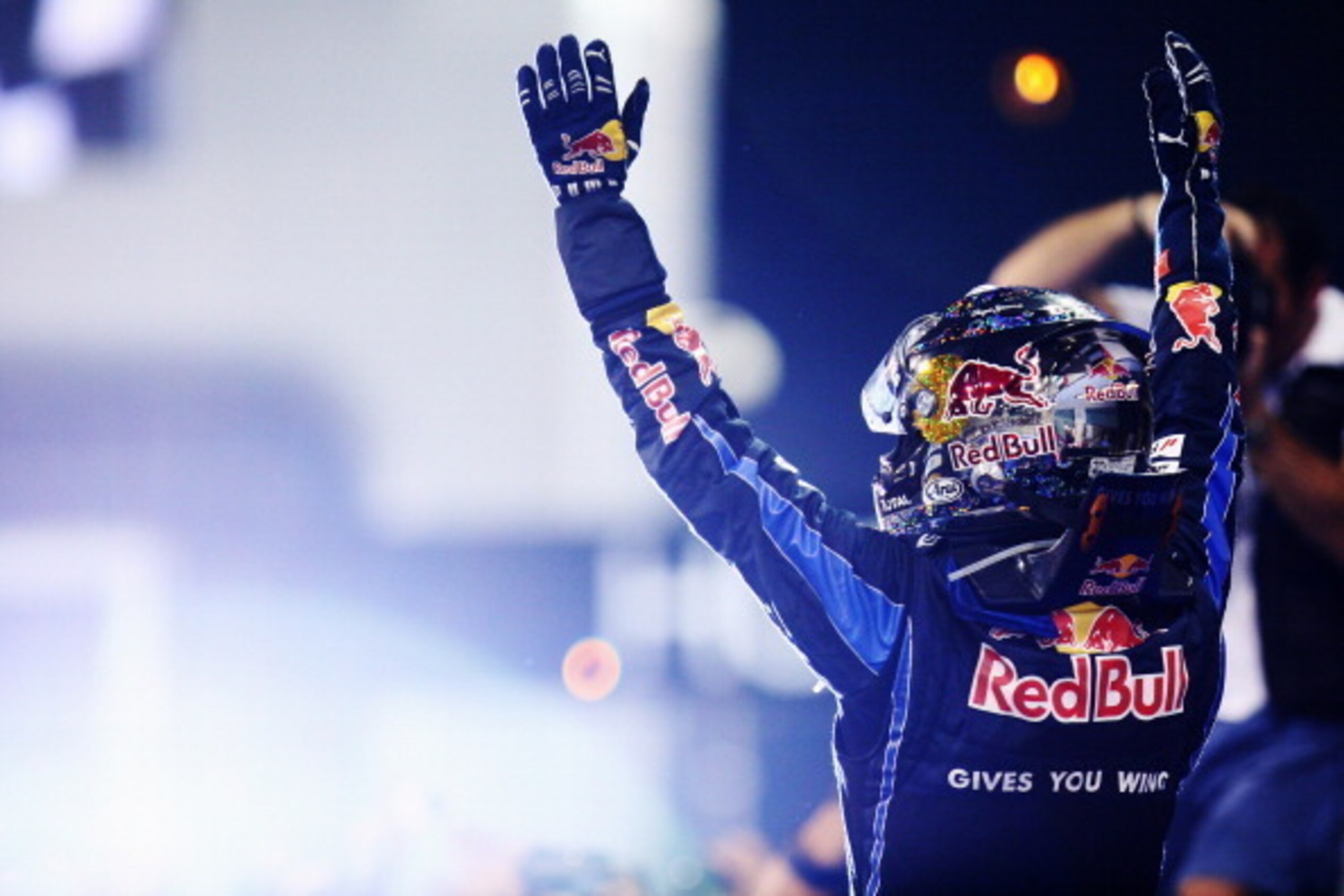 ABU DHABI, UNITED ARAB EMIRATES - NOVEMBER 14:  Race winner and F1 2010 World Champion Sebastian Vettel of Germany and Red Bull Racing celebrates in parc ferme following the Abu Dhabi Formula One Grand Prix at the Yas Marina Circuit on November 14, 2010 i