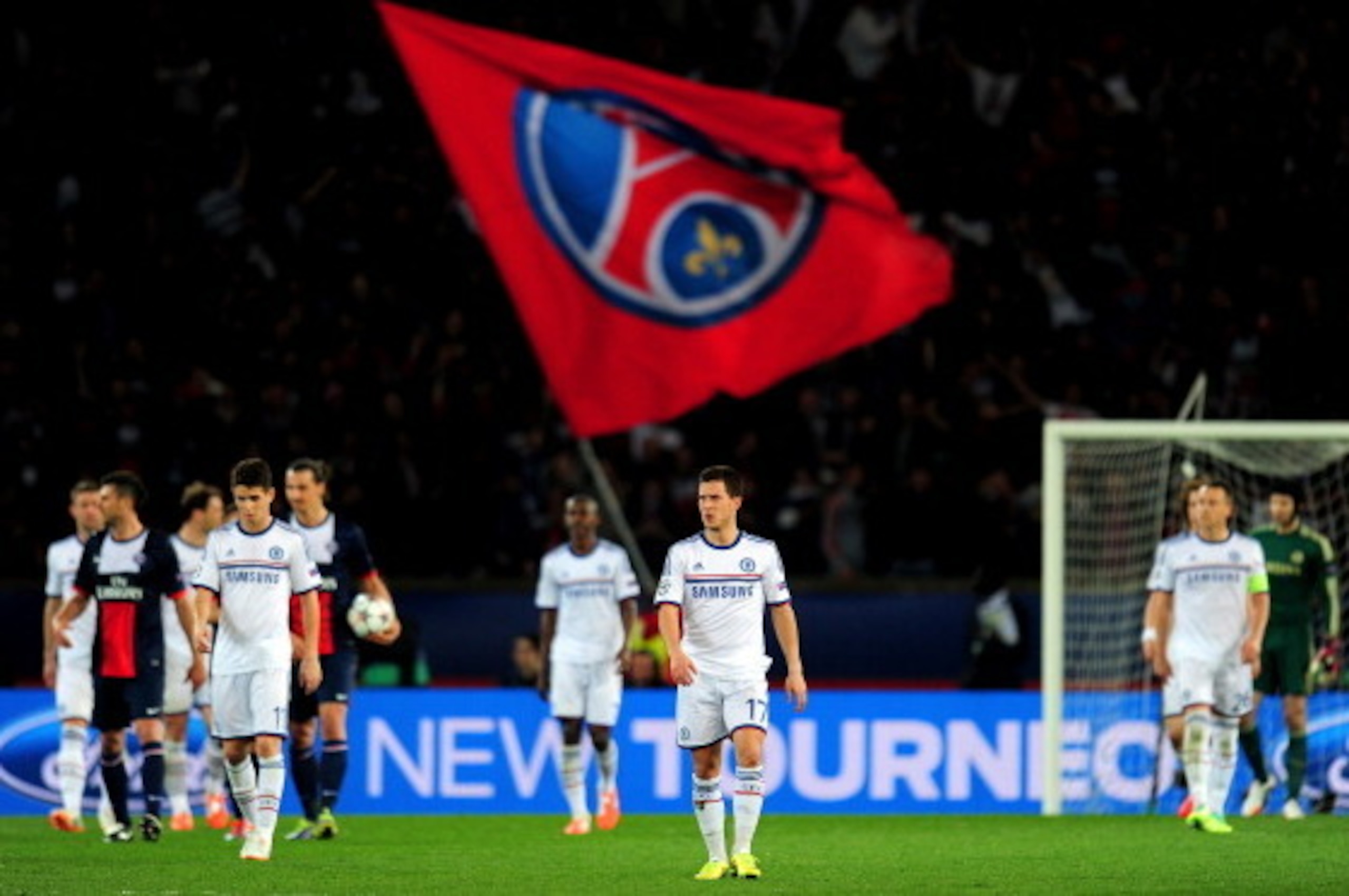 PARIS, FRANCE - APRIL 02:  Dejected Chelsea players look on after conceding a second goal during the UEFA Champions League quarter final, first leg match between Paris Saint Germain and Chelsea at Parc des Princes on April 2, 2014 in Paris, France.  (Phot