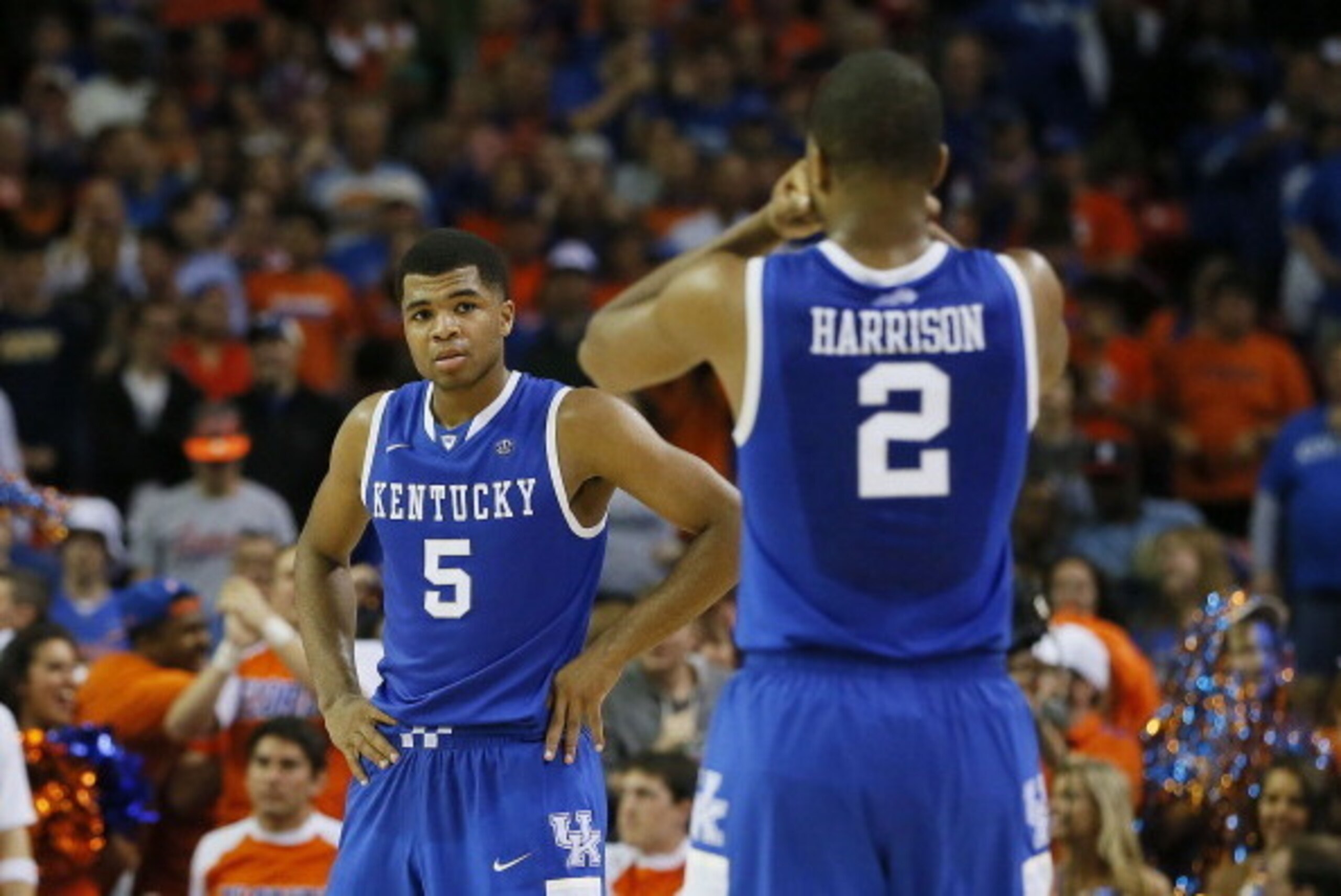 ATLANTA, GA - MARCH 16: Aaron Harrison #2 and Andrew Harrison #5 of the Kentucky Wildcats react in the second half against the Florida Gators during the Championship game of the 2014 Men's SEC Basketball Tournament at Georgia Dome on March 16, 2014 in At ATLANTA, GA - MARCH 16: Aaron Harrison #2 and Andrew Harrison #5 of the Kentucky Wildcats react in the second half against the Florida Gators during the Championship game of the 2014 Men's SEC Basketball Tournament at Georgia Dome on March 16, 2014 in At