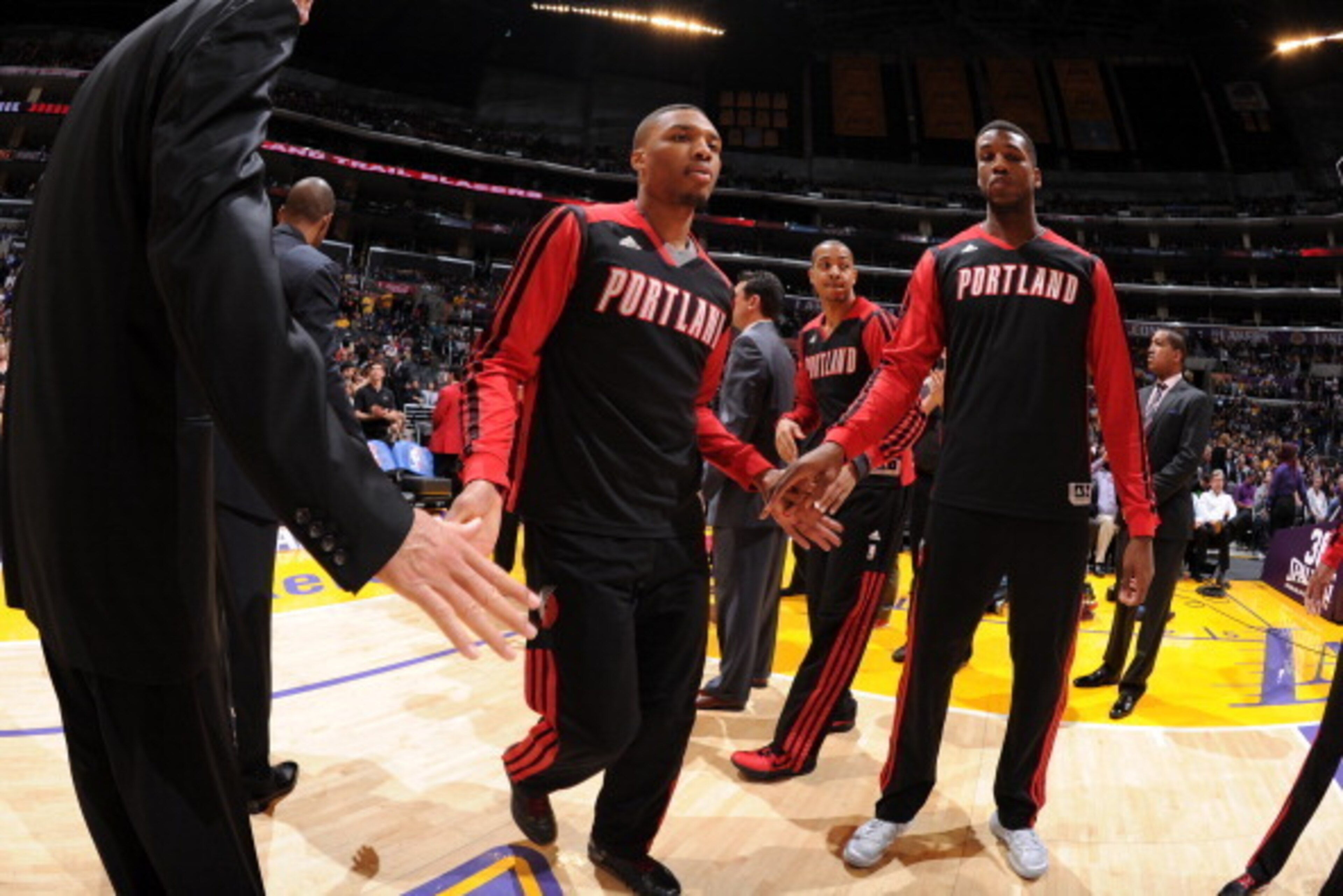 LOS ANGELES, CA - APRIL 1: Damian Lillard #0 of the Portland Trail Blazers runs out before the game against the Los Angeles Lakers at Staples Center on April 1, 2014 in Los Angeles, California. NOTE TO USER: User expressly acknowledges and agrees that, LOS ANGELES, CA - APRIL 1: Damian Lillard #0 of the Portland Trail Blazers runs out before the game against the Los Angeles Lakers at Staples Center on April 1, 2014 in Los Angeles, California. NOTE TO USER: User expressly acknowledges and agrees that,