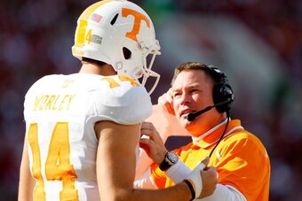 TUSCALOOSA, AL - OCTOBER 26:  Head coach Butch Jones of the Tennessee Volunteers converses with Justin Worley #14 against the Alabama Crimson Tide at Bryant-Denny Stadium on October 26, 2013 in Tuscaloosa, Alabama.  (Photo by Kevin C. Cox/Getty Images)