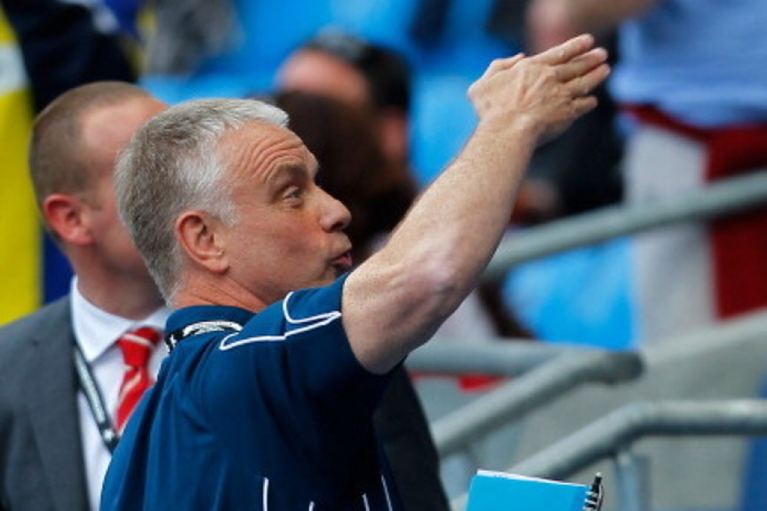 MANCHESTER, ENGLAND - MAY 26: Head coach Brian Noble of Salford blows a kiss towards the stands after the Super League Magic Weekend match between Salford City Reds and Widnes Vikings at the Etihad Stadium on May 26, 2013 in Manchester, England. (Photo b MANCHESTER, ENGLAND - MAY 26: Head coach Brian Noble of Salford blows a kiss towards the stands after the Super League Magic Weekend match between Salford City Reds and Widnes Vikings at the Etihad Stadium on May 26, 2013 in Manchester, England. (Photo b