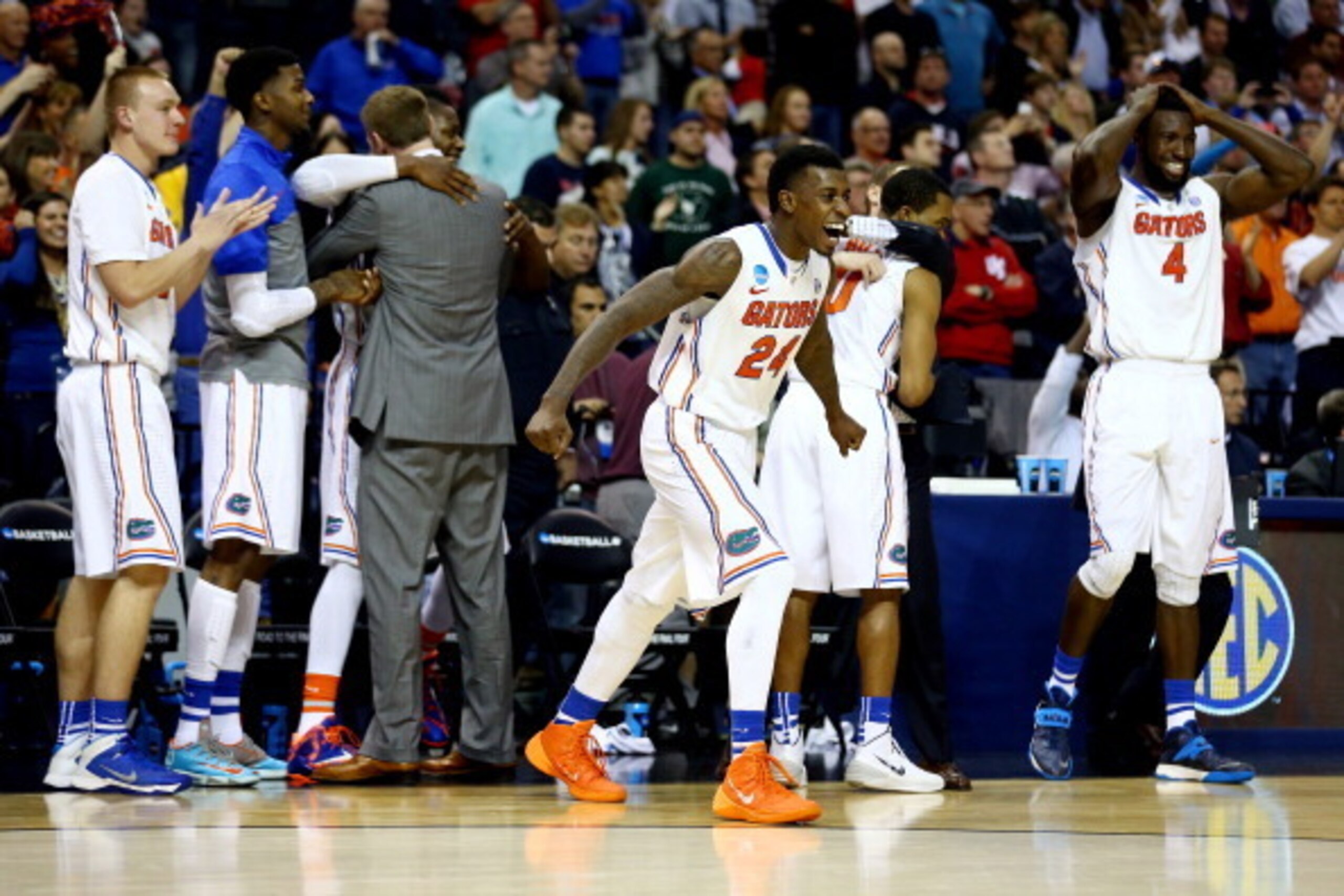 MEMPHIS, TN - MARCH 29: Casey Prather #24 of the Florida Gators runs onto the court after defeating the Dayton Flyers 62-52 in the south regional final of the 2014 NCAA Men's Basketball Tournament at the FedExForum on March 29, 2014 in Memphis, Tennessee. MEMPHIS, TN - MARCH 29: Casey Prather #24 of the Florida Gators runs onto the court after defeating the Dayton Flyers 62-52 in the south regional final of the 2014 NCAA Men's Basketball Tournament at the FedExForum on March 29, 2014 in Memphis, Tennessee.