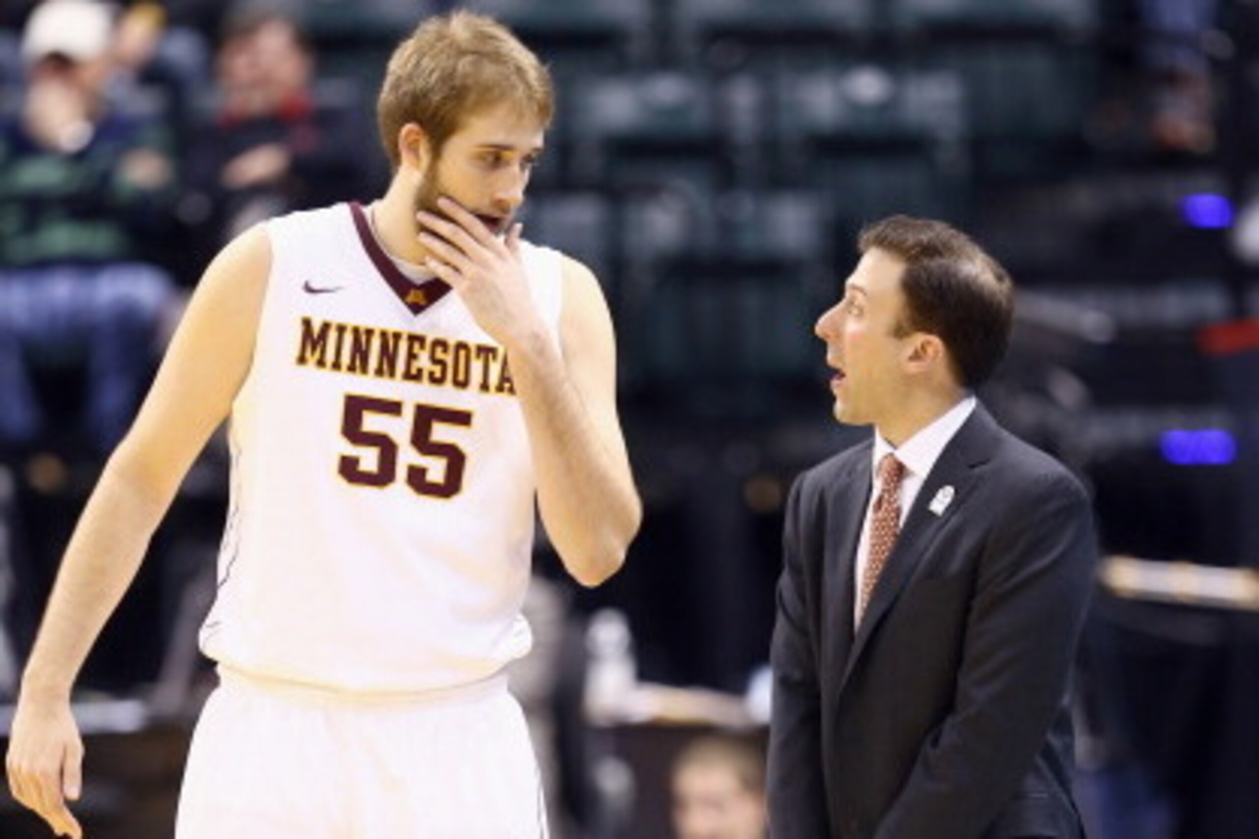 INDIANAPOLIS, IN - MARCH 13: Richard Pitino the head coach of the Minnesota Golden Gophers gives instructions to Elliott Eliason #55 in the game against the Penn State Nittany Lions during the first round of the Big Ten Basketball Tournament at Bankers INDIANAPOLIS, IN - MARCH 13: Richard Pitino the head coach of the Minnesota Golden Gophers gives instructions to Elliott Eliason #55 in the game against the Penn State Nittany Lions during the first round of the Big Ten Basketball Tournament at Bankers