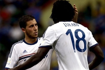 KUALA LUMPUR, MALAYSIA - JULY 21: Eden Hazard of Chelsea congratulates Romelu Lukaku after he scored the 3rd goal  during the match between Chelsea and Malaysia XI on July 21, 2013 in Kuala Lumpur, Malaysia.  (Photo by Stanley Chou/Getty Images)