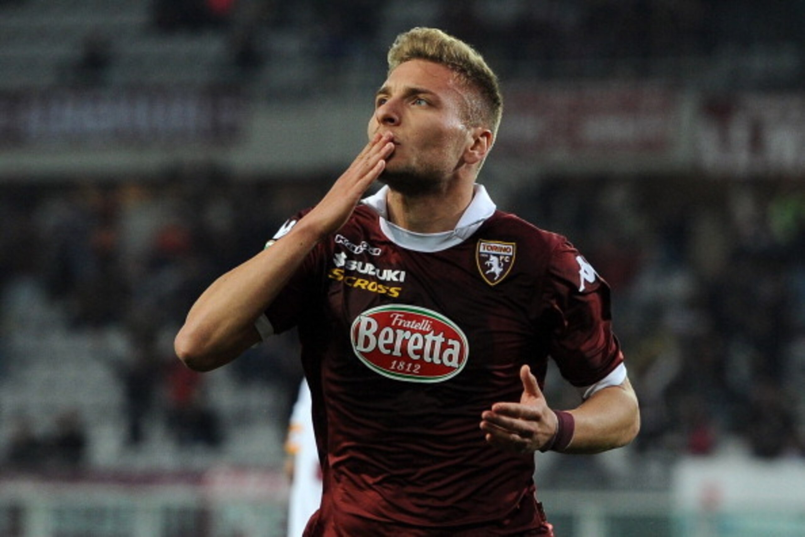 TURIN, ITALY - MARCH 22:  Ciro Immobile of Torino FC celebrates after scoring the opening goal during the Serie A match between Torino FC and AS Livorno Calcio at Stadio Olimpico di Torino on March 22, 2014 in Turin, Italy.  (Photo by Valerio Pennicino/Ge