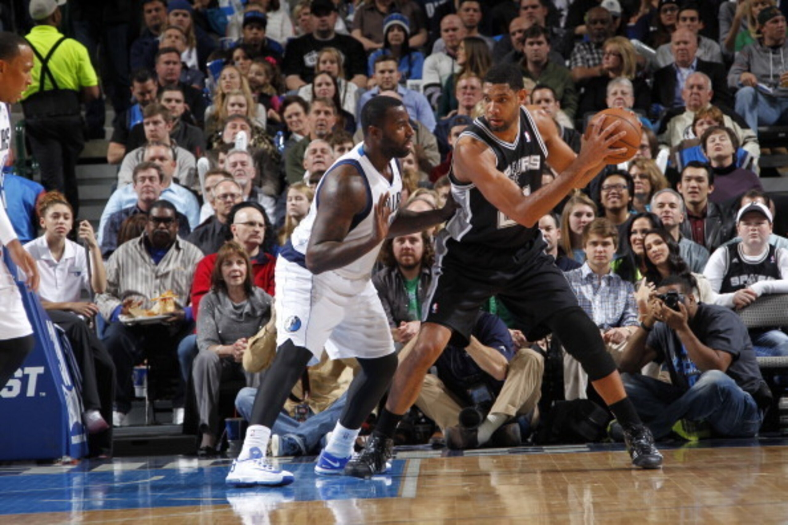 DALLAS, TX - DECEMBER 26: Tim Duncan #21 of the San Antonio Spurs posts up against DeJuan Blair #45 of the Dallas Mavericks on December 26, 2013 at the American Airlines Center in Dallas, Texas. NOTE TO USER: User expressly acknowledges and agrees that, b