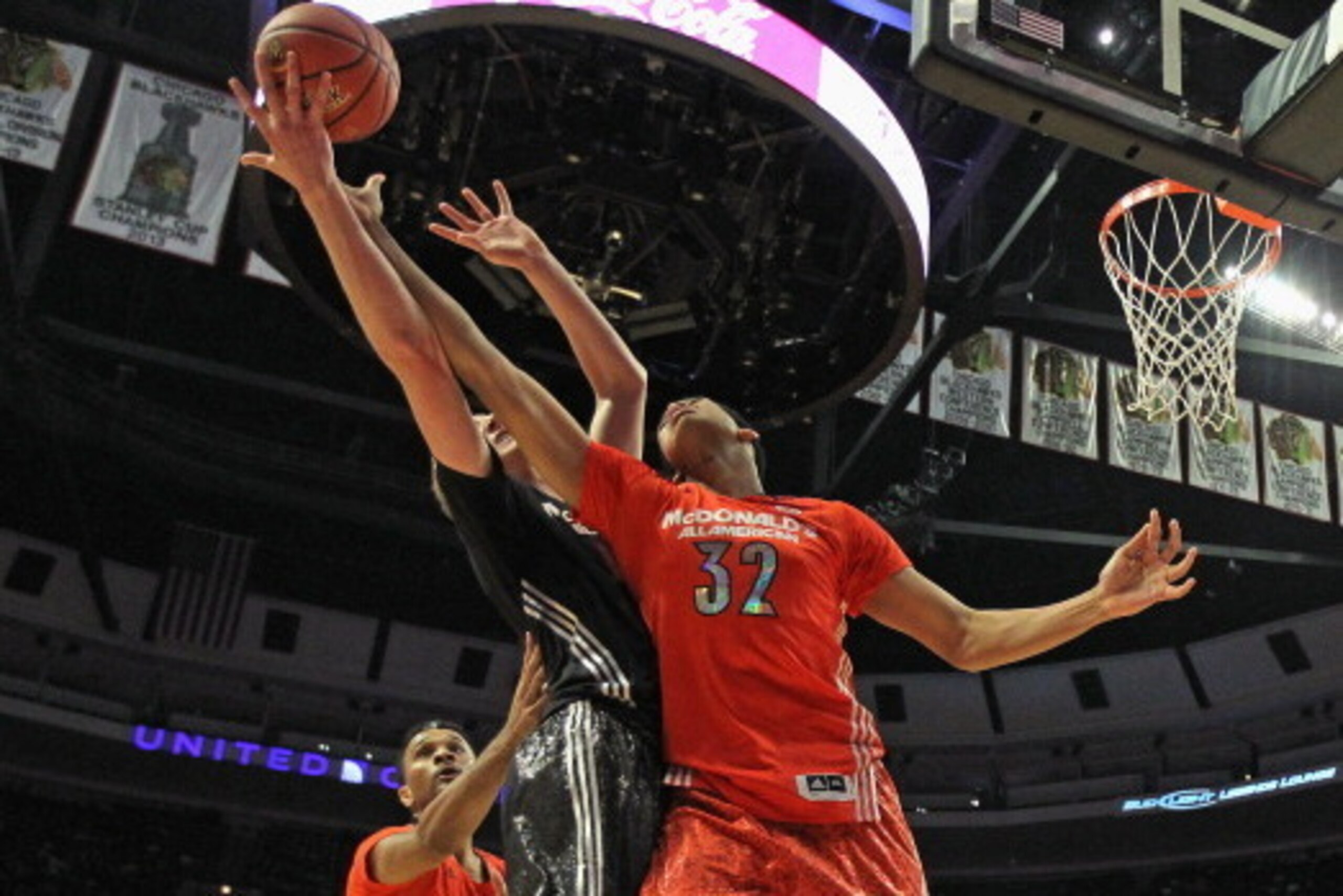 CHICAGO, IL - APRIL 02: Karl-Anthony Thomas #32 of the east team battles for a rebound with Thomas Welsh #40 of the west team during the 2014 McDonald's All American Game at United Center on April 2, 2014 in Chicago, Illinois. (Photo by Jonathan Daniel/Ge