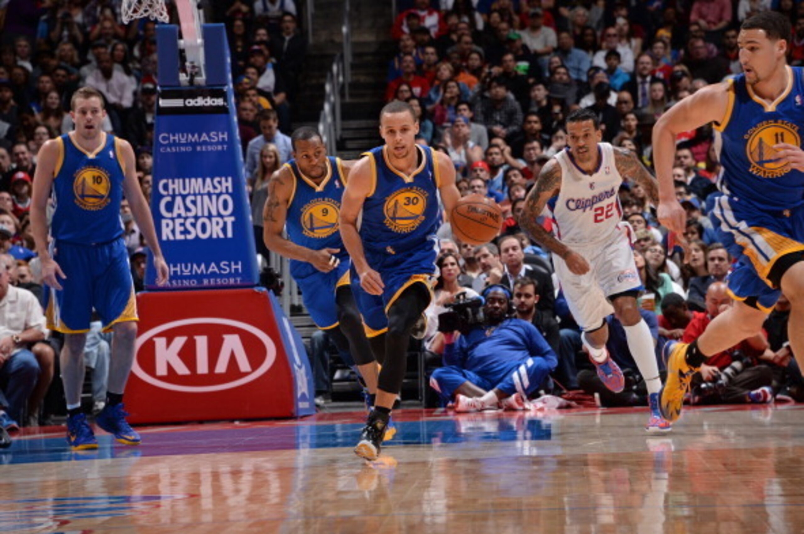 LOS ANGELES, CA - MARCH 12: Stephen Curry #30 of the Golden State Warriors drives down the court against the Los Angeles Clippers at Staples Center on March 12, 2014 in Los Angeles, California. NOTE TO USER: User expressly acknowledges and agrees that, by