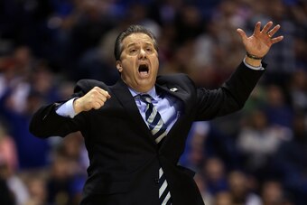 INDIANAPOLIS, IN - MARCH 30:  Head coach John Calipari of the Kentucky Wildcats shouts to his players against the Michigan Wolverines during the midwest regional final of the 2014 NCAA Men's Basketball Tournament at Lucas Oil Stadium on March 30, 2014 in