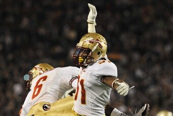 ORLANDO, FL - DECEMBER 29: Defensive back Terrence Brooks #31 of the Florida State Seminoles celebrates a forth quarter interception against the Notre Dame Fight Irish  December 29, 2011 at the Florida Citrus Bowl in Orlando, Florida.  FSU won 18 - 14. (P
