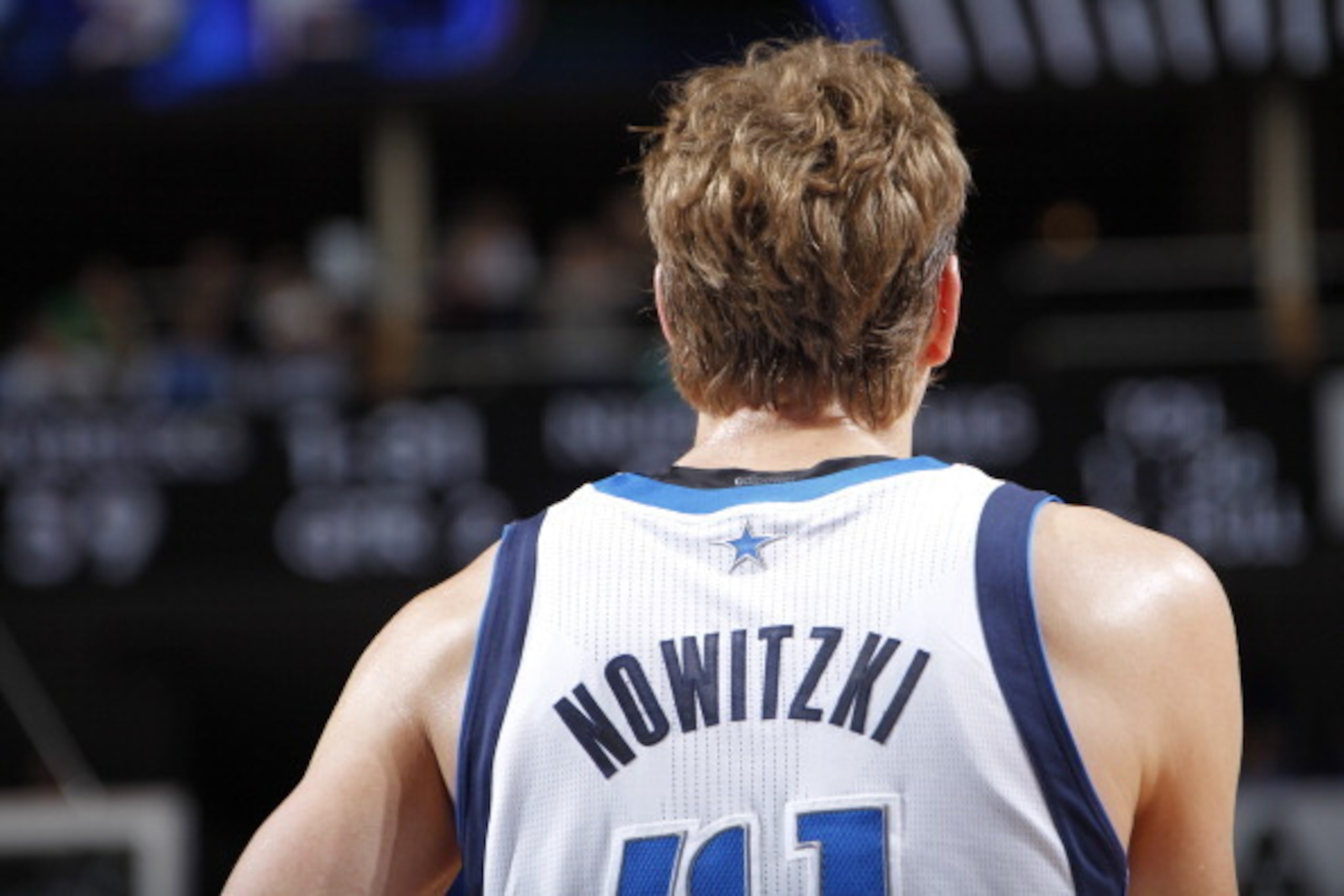 DALLAS, TX - MARCH 21: Dirk Nowitzki #41 of the Dallas Mavericks on the court during the game against the Denver Nuggets on March 21, 2014 at the American Airlines Center in Dallas, Texas. NOTE TO USER: User expressly acknowledges and agrees that, by down