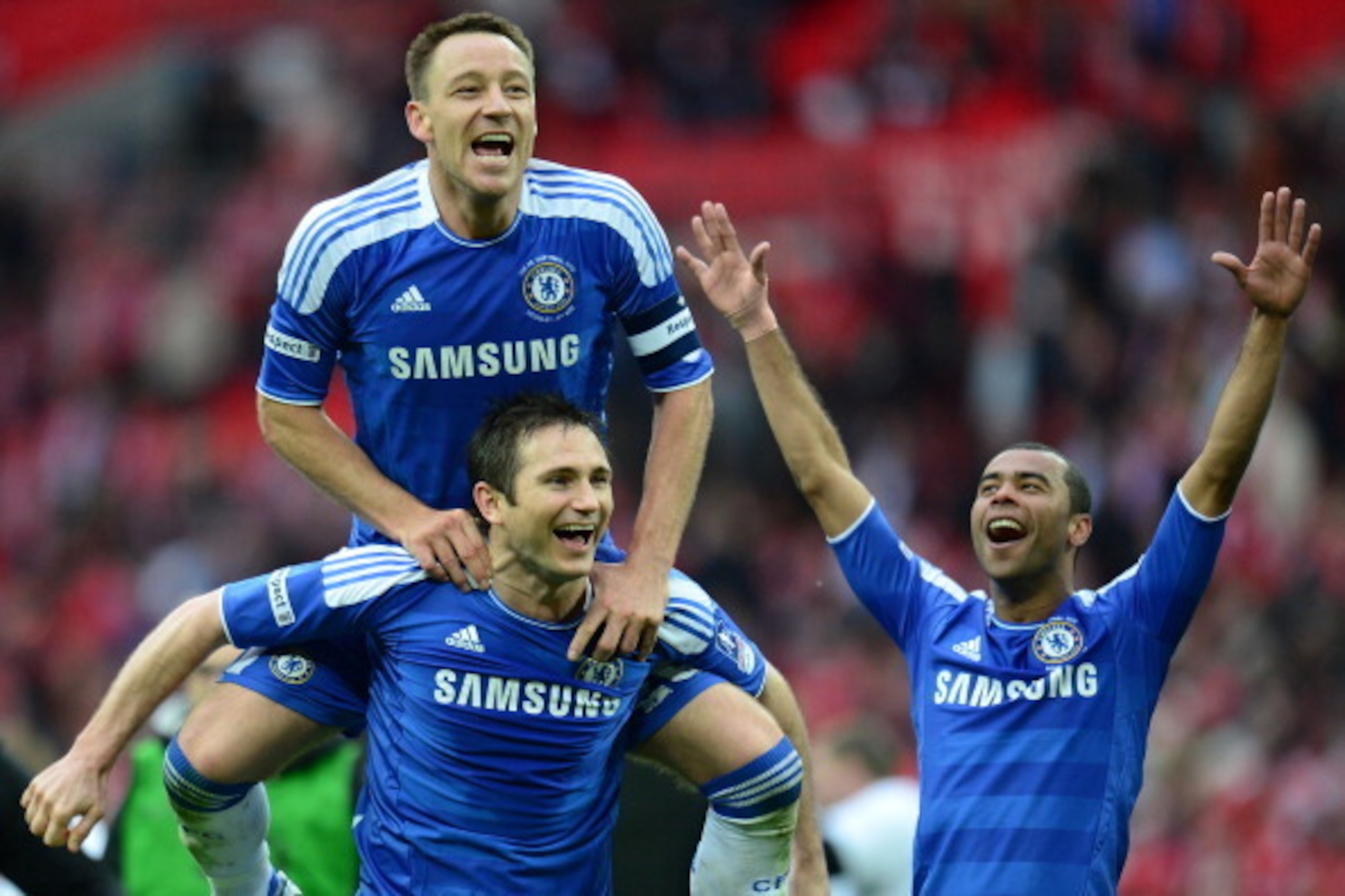 LONDON, ENGLAND - MAY 05: John Terry, Frank Lampard and Ashley Cole of Chelsea celebrate victory after the FA Cup with Budweiser Final match between Liverpool and Chelsea at Wembley Stadium on May 5, 2012 in London, England.  (Photo by Shaun Botterill/Get