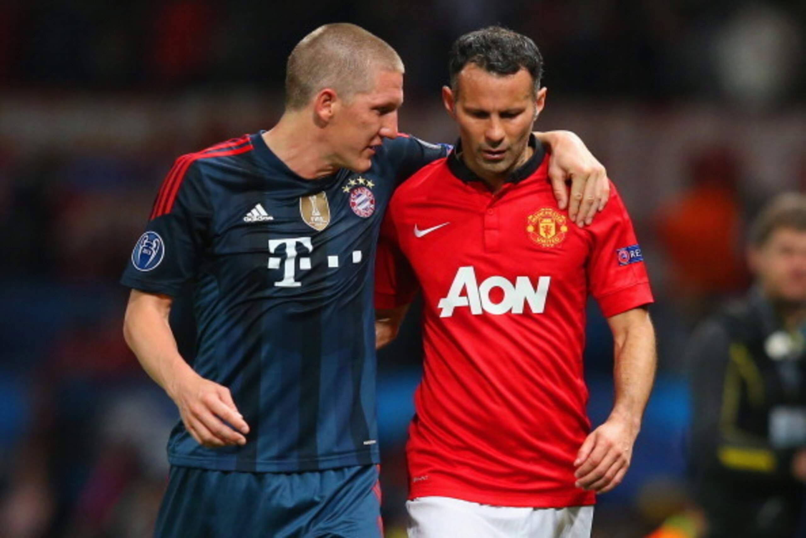 MANCHESTER, ENGLAND - APRIL 01:  Bastian Schweinsteiger of Bayern Muenchen and Ryan Giggs of Manchester United walk in at half time during the UEFA Champions League Quarter Final first leg match between Manchester United and FC Bayern Muenchen at Old Traf