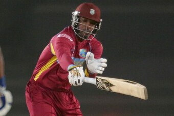DHAKA, BANGLADESH - APRIL 03:  Chris Gayle of the West Indies is bowled out by Lasith Malinga of Sri Lanka during the ICC World Twenty20 Bangladesh 2014 1st Semi-Final match between Sri Lanka and the West Indies at Sher-e-Bangla Mirpur Stadium on April 3,