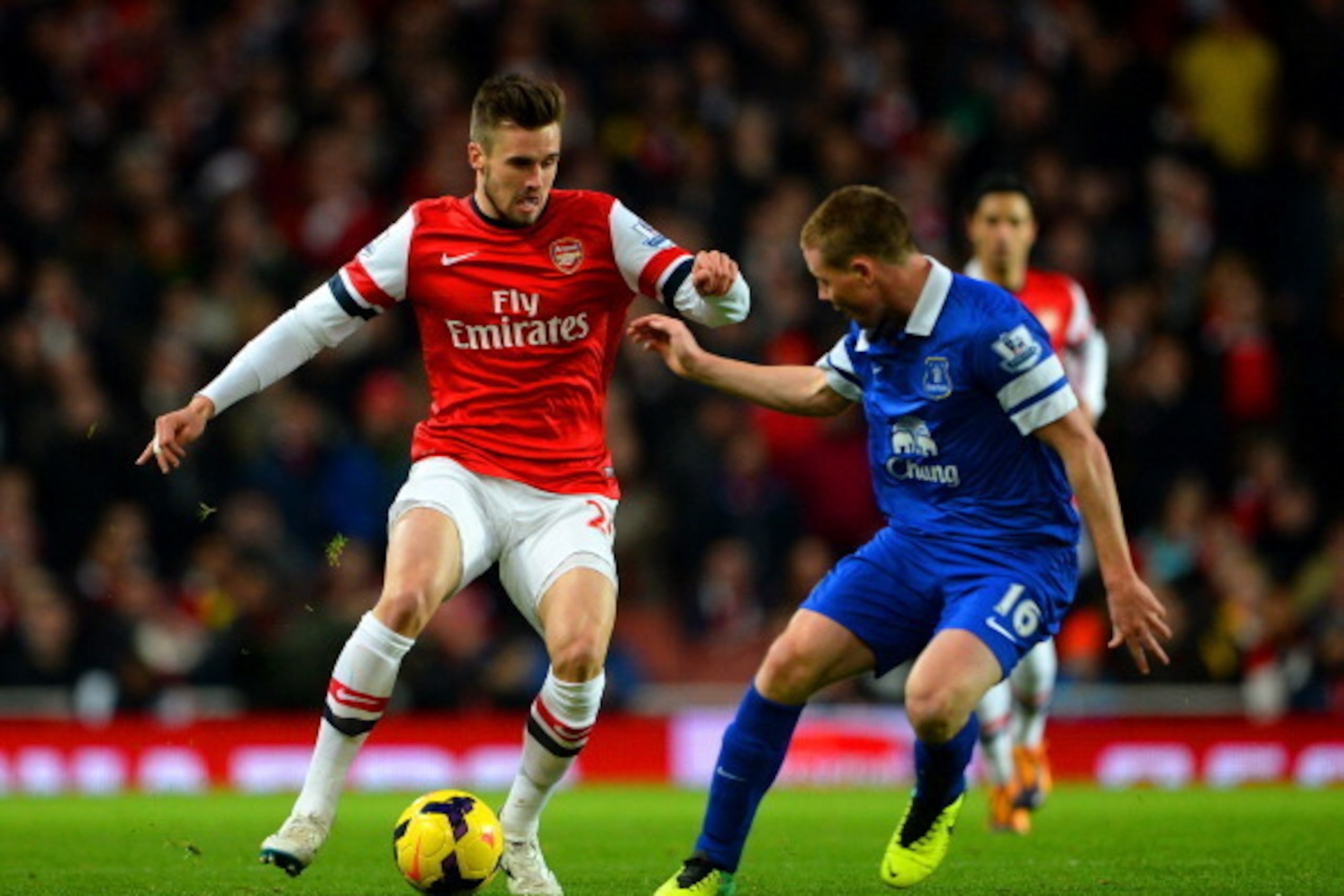 LONDON, ENGLAND - DECEMBER 08: Carl Jenkinson of Arsenal is closed down by James McCarthy of Everton during the Barclays Premier League match between Arsenal and Everton at Emirates Stadium on December 8, 2013 in London, England. (Photo by Michael Rega LONDON, ENGLAND - DECEMBER 08: Carl Jenkinson of Arsenal is closed down by James McCarthy of Everton during the Barclays Premier League match between Arsenal and Everton at Emirates Stadium on December 8, 2013 in London, England. (Photo by Michael Rega