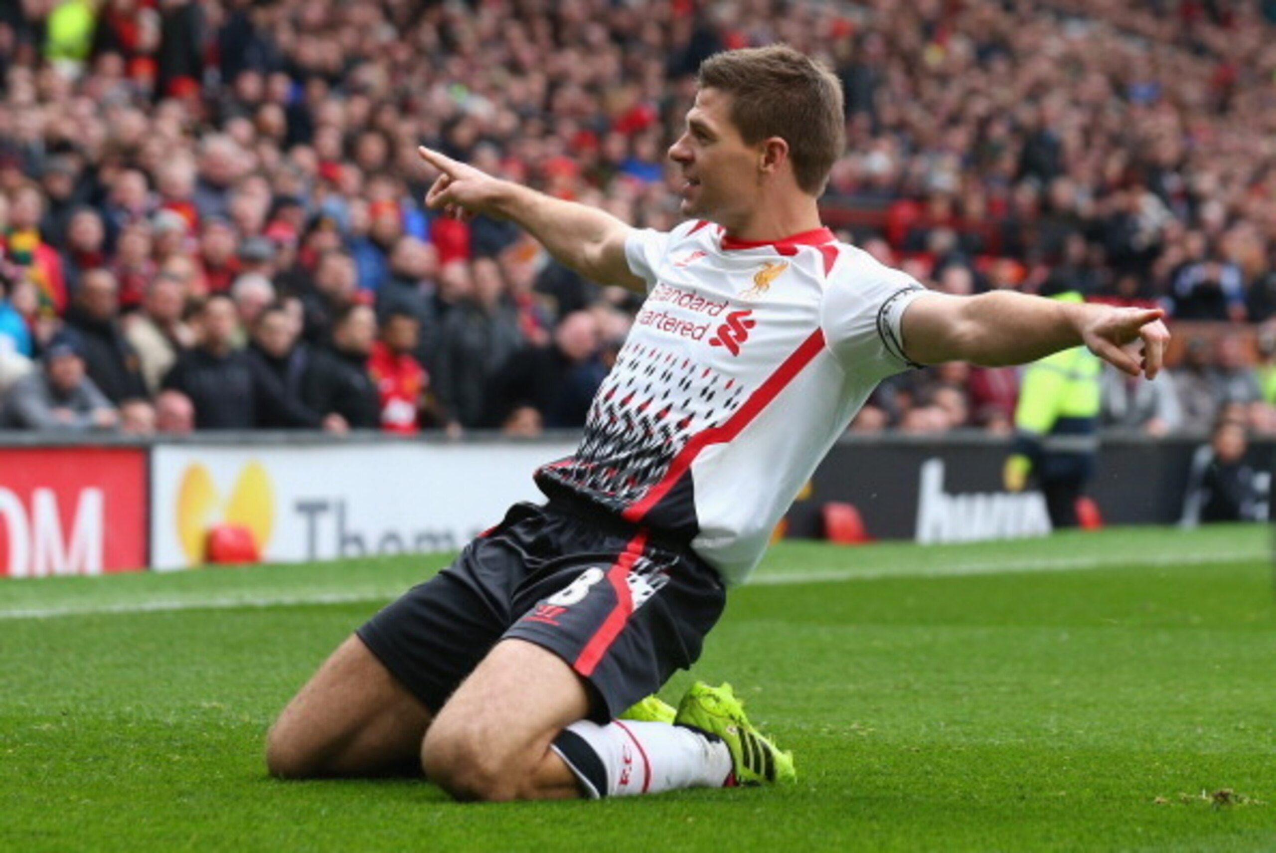 MANCHESTER, ENGLAND - MARCH 16:  Steven Gerrard of Liverpool celebrates scoring the second goal during the Barclays Premier League match between Manchester United and Liverpool at Old Trafford on March 16, 2014 in Manchester, England.  (Photo by Alex Live