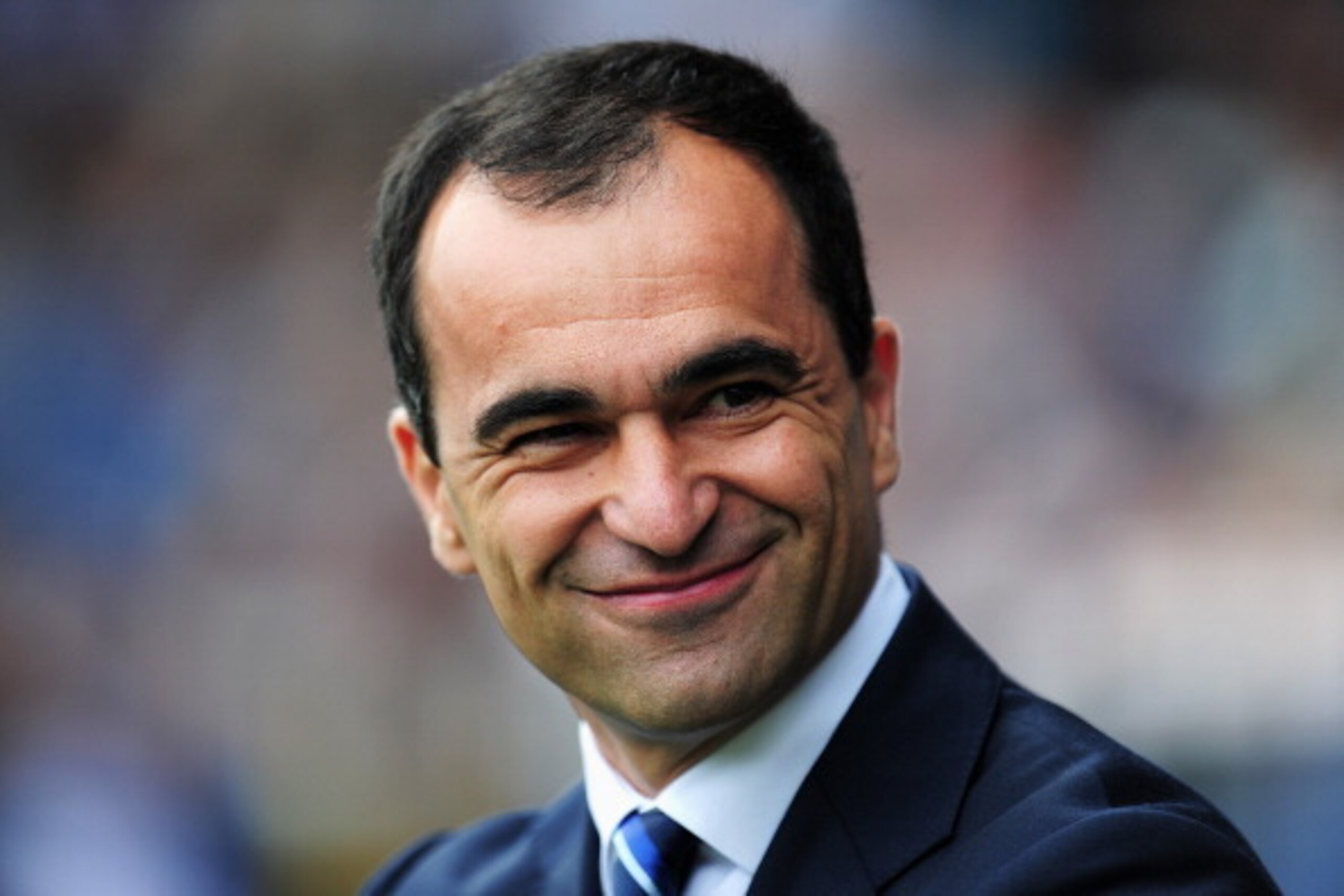 LONDON, ENGLAND - MARCH 30:  Manager Roberto Martinez of Everton smiles during the Barclays Premier League match between Fulham and Everton at Craven Cottage on March 30, 2014 in London, England.  (Photo by Shaun Botterill/Getty Images)