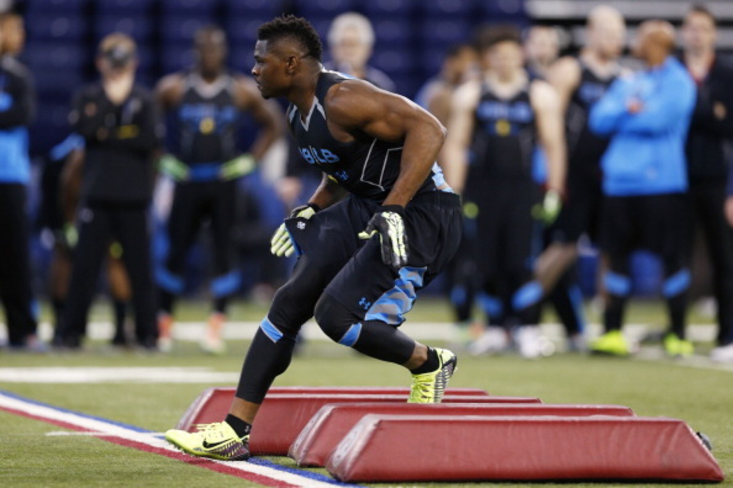 INDIANAPOLIS, IN - FEBRUARY 24: Former Buffalo linebacker Khalil Mack takes part in a position drill during the 2014 NFL Combine at Lucas Oil Stadium on February 24, 2014 in Indianapolis, Indiana. (Photo by Joe Robbins/Getty Images) INDIANAPOLIS, IN - FEBRUARY 24: Former Buffalo linebacker Khalil Mack takes part in a position drill during the 2014 NFL Combine at Lucas Oil Stadium on February 24, 2014 in Indianapolis, Indiana. (Photo by Joe Robbins/Getty Images)