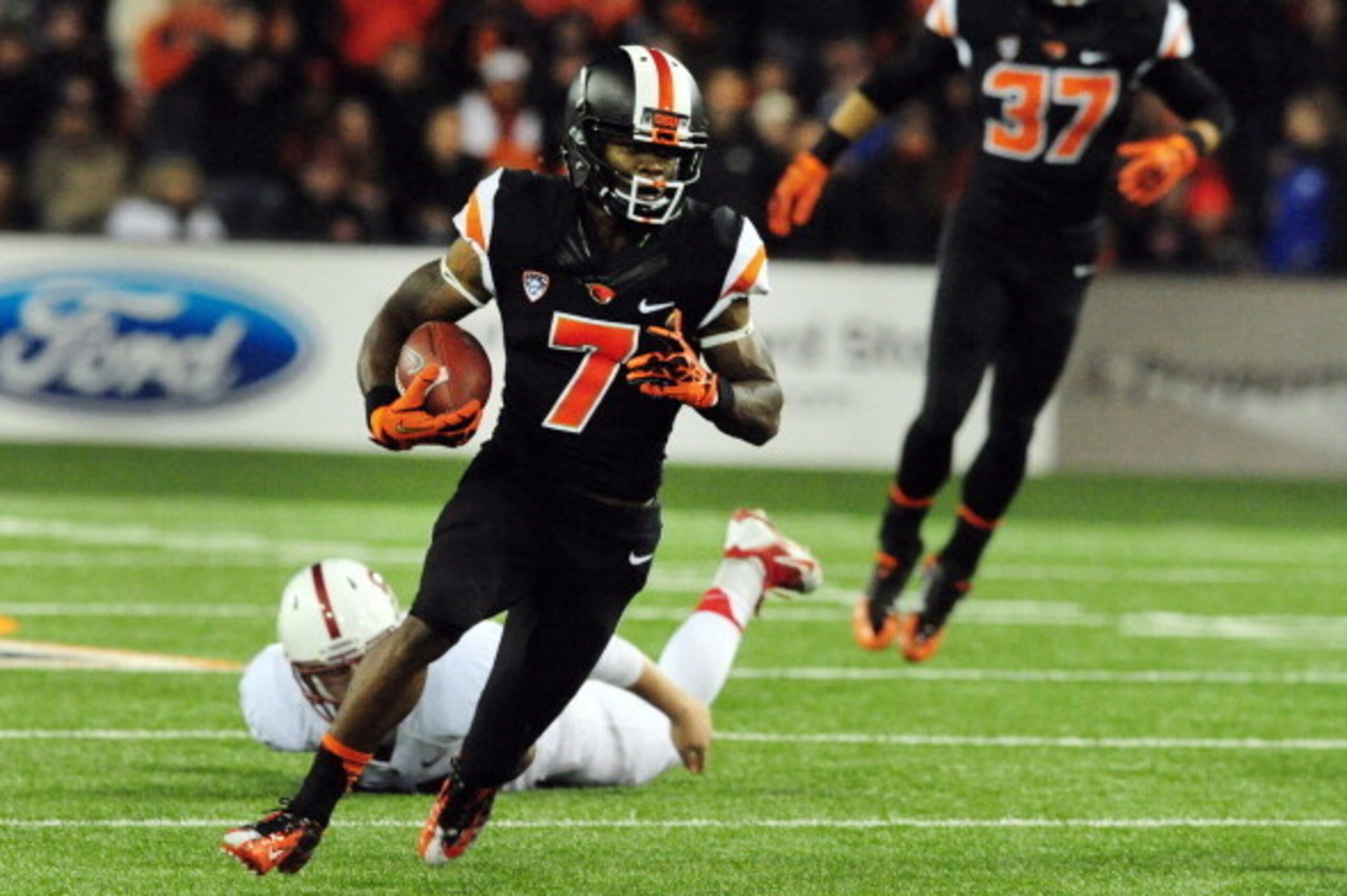 CORVALLIS, OR - OCTOBER 26: Wide receiver Brandin Cooks #7 of the Oregon State Beavers runs back a punt during the fourth quarter of the game against the Stanford Cardinal at Reser Stadium on October 26, 2013 in Corvallis, Oregon. Stanford won the game 20 CORVALLIS, OR - OCTOBER 26: Wide receiver Brandin Cooks #7 of the Oregon State Beavers runs back a punt during the fourth quarter of the game against the Stanford Cardinal at Reser Stadium on October 26, 2013 in Corvallis, Oregon. Stanford won the game 20