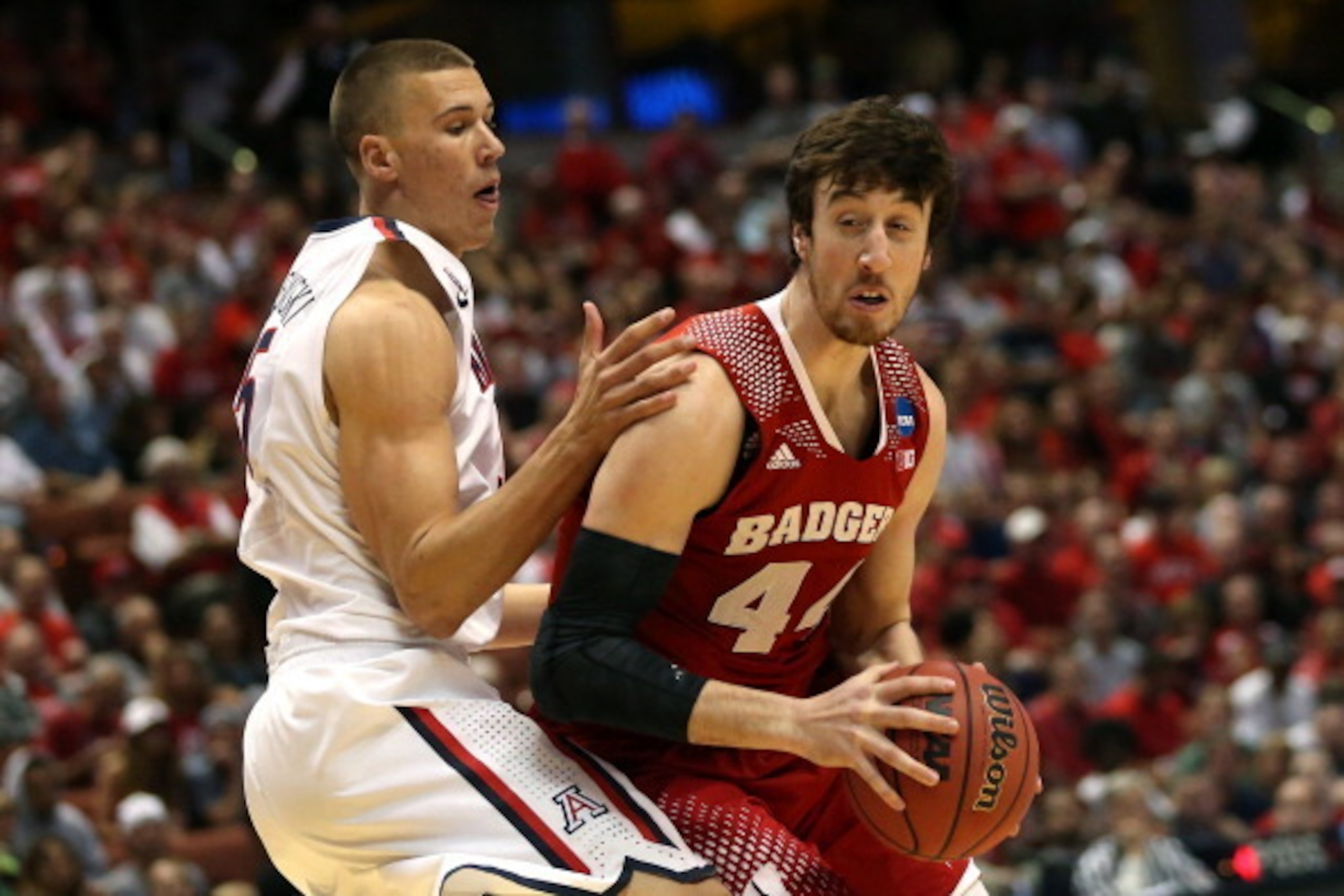 ANAHEIM, CA - MARCH 29:  Frank Kaminsky #44 of the Wisconsin Badgers looks to shoot against Kaleb Tarczewski #35 of the Arizona Wildcats in the first half during the West Regional Final of the 2014 NCAA Men's Basketball Tournament at the Honda Center on M