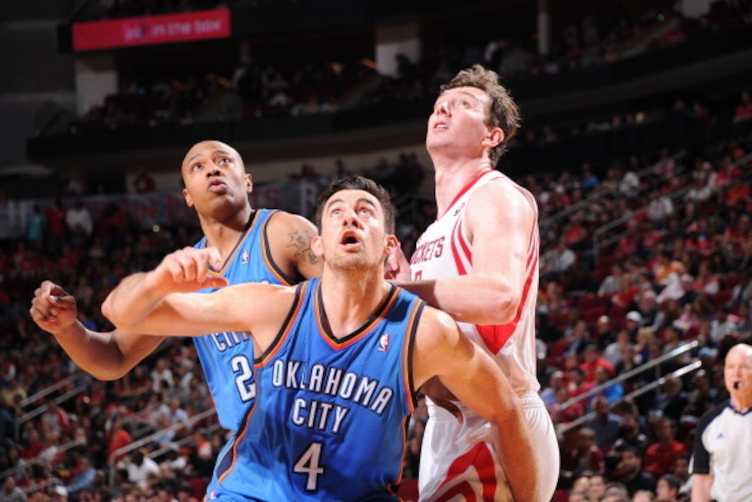 HOUSTON, TX - APRIL 4: Nick Collison #4 of the Oklahoma City Thunder boxes out Omer Asik #3 of the Houston Rockets during the game on April 4, 2014 at the Toyota Center in Houston, Texas. NOTE TO USER: User expressly acknowledges and agrees that, by down HOUSTON, TX - APRIL 4: Nick Collison #4 of the Oklahoma City Thunder boxes out Omer Asik #3 of the Houston Rockets during the game on April 4, 2014 at the Toyota Center in Houston, Texas. NOTE TO USER: User expressly acknowledges and agrees that, by down