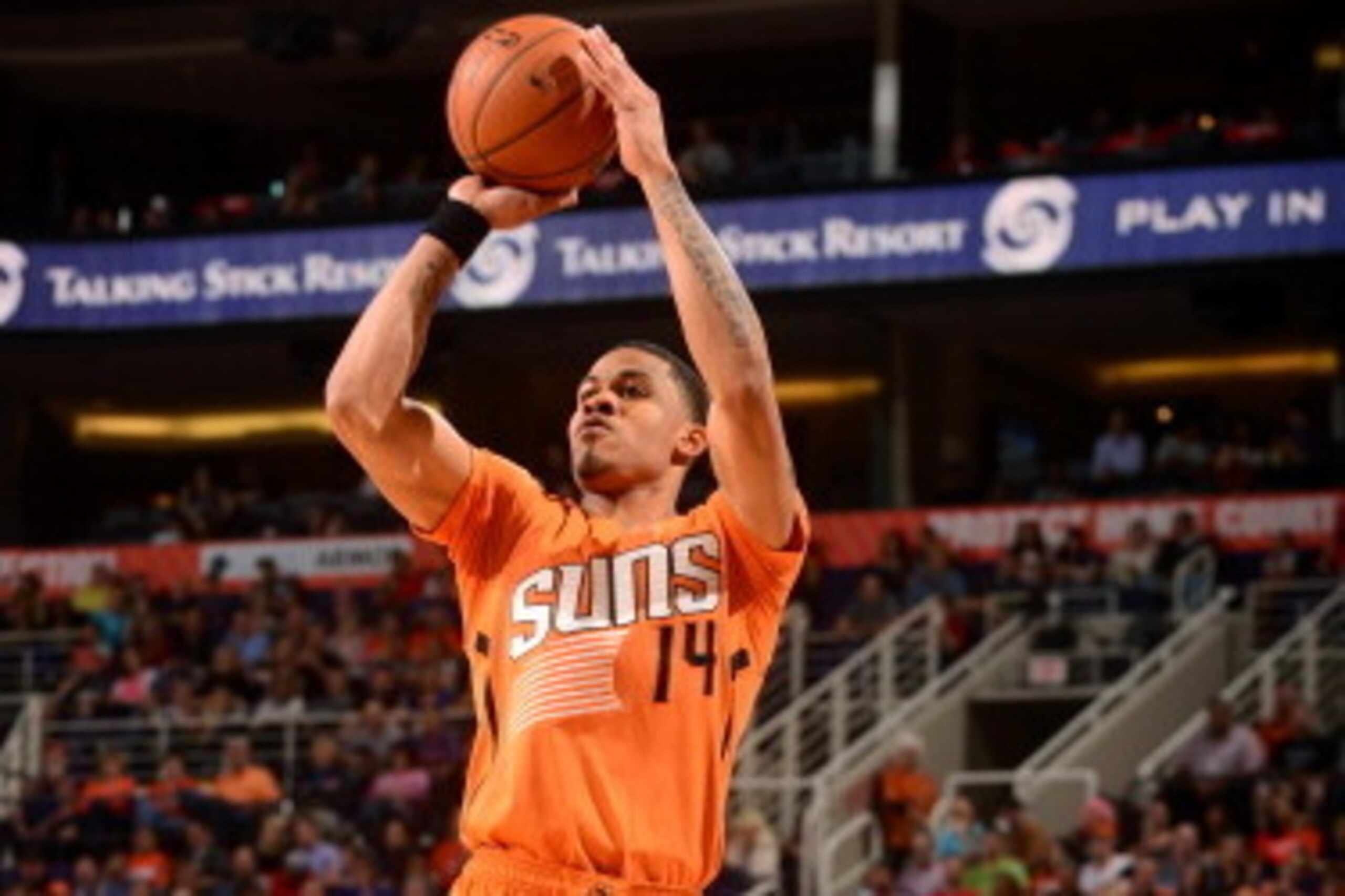 PHOENIX, AZ - MARCH 21: Gerald Green #14 of the Phoenix Suns shoots against the Phoenix Suns on March 21, 2014 at U.S. Airways Center in Phoenix, Arizona. NOTE TO USER: User expressly acknowledges and agrees that, by downloading and or using this photogra