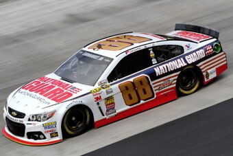 BRISTOL, TN - MARCH 14: Dale Earnhardt Jr. drives the #88 National Guard Chevrolet during qualifying for the NASCAR Sprint Cup Series Food City 500 at Bristol Motor Speedway on March 14, 2014 in Bristol, Tennessee.  (Photo by Jerry Markland/Getty Images)