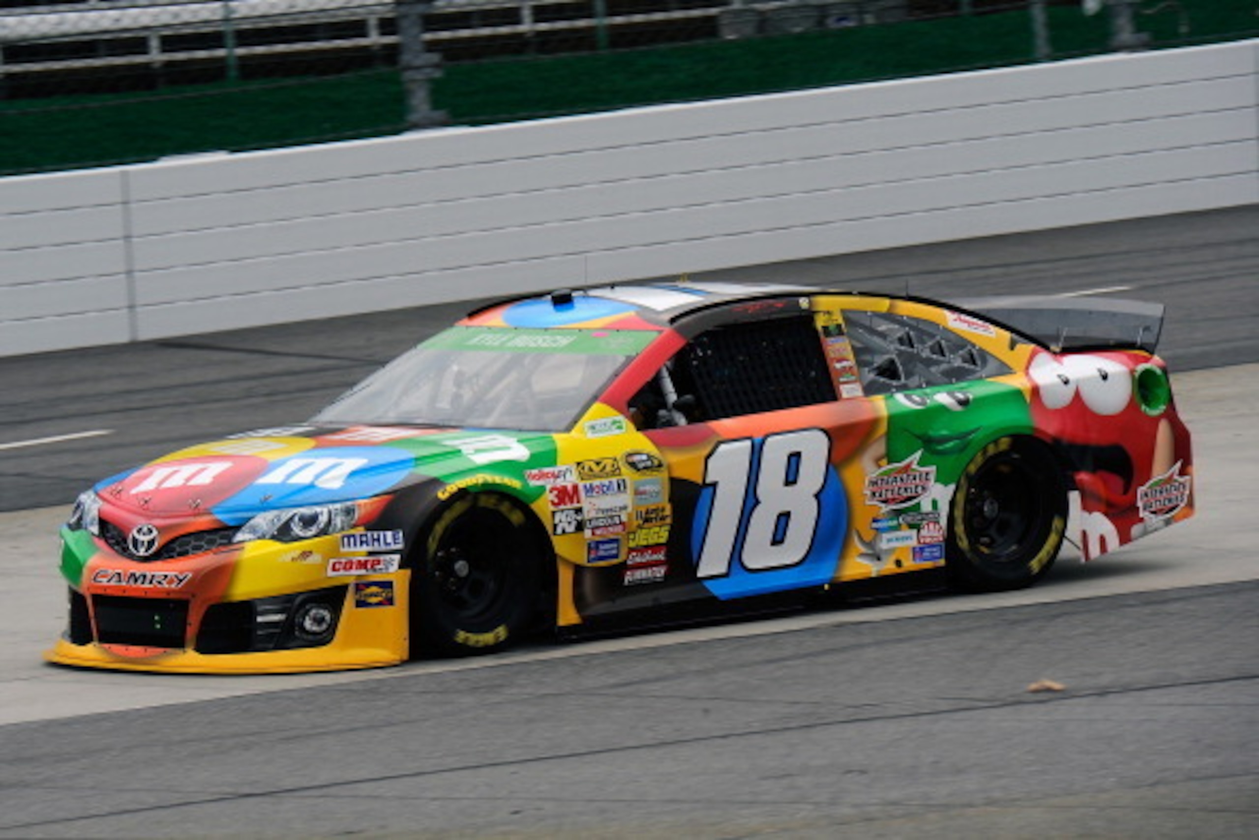 MARTINSVILLE, VA - MARCH 28:  Kyle Busch, driver of the #18 M&M's Toyota, practices for the NASCAR Sprint Cup Series STP 500 at Martinsville Speedway on March 28, 2014 in Martinsville, Virginia.  (Photo by Jared C. Tilton/Getty Images)