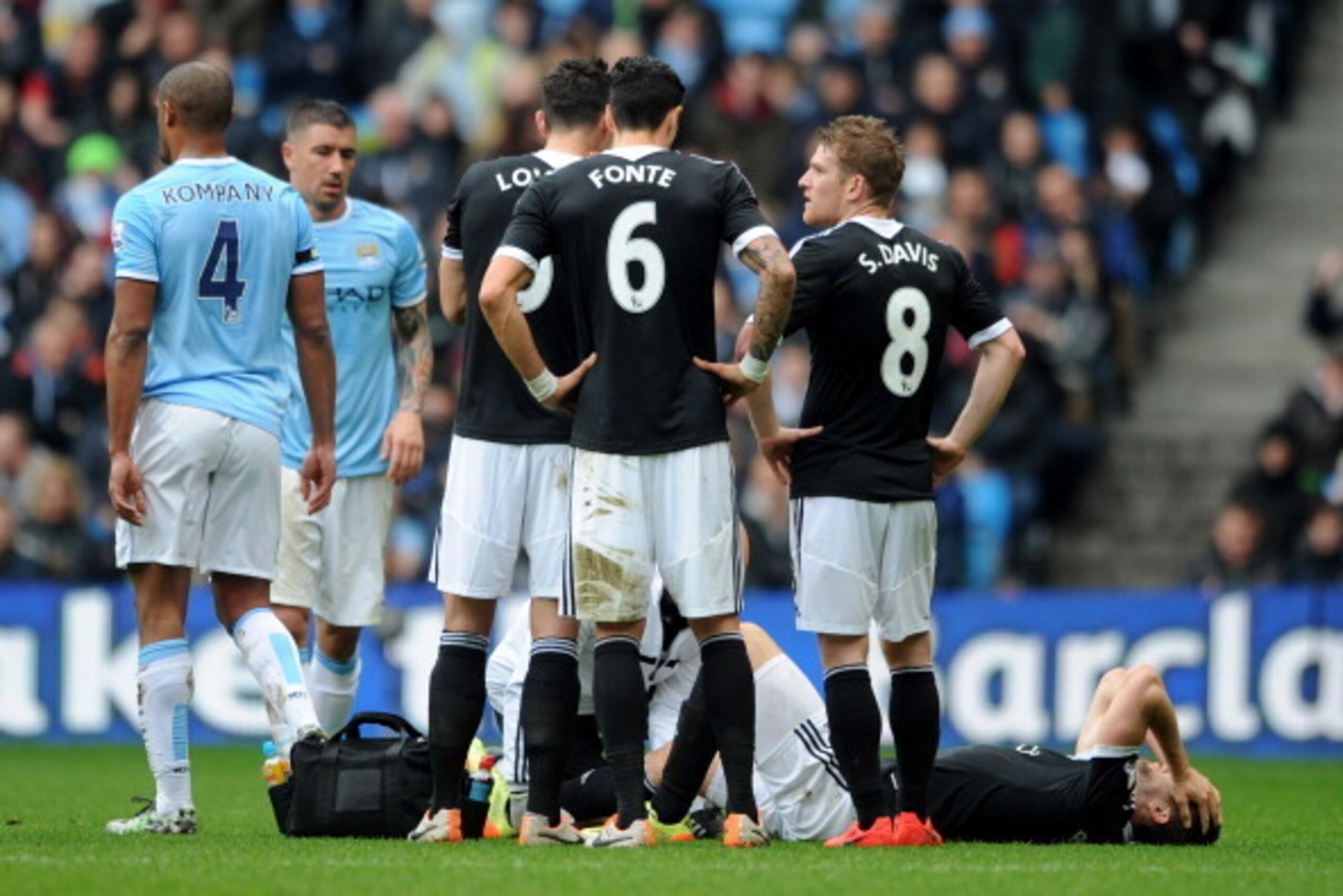 MANCHESTER, ENGLAND - APRIL 05:  Jay Rodriguez of Southampton goes down injured after landing awkwardly during the Barclays Premier League match between Manchester City and Southampton at Etihad Stadium on April 5, 2014 in Manchester, England.  (Photo by 