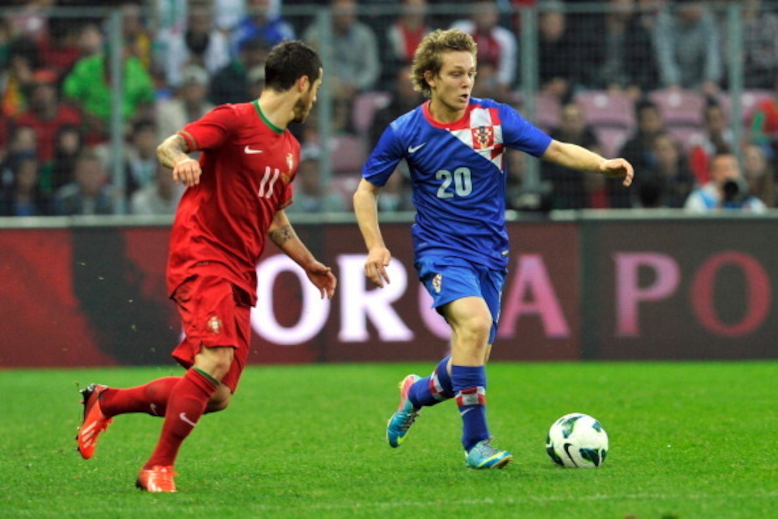 GENEVA, SWITZERLAND - JUNE 10:  Alen Halilovic of Croatia fights for the ball with Adelino Vieirinha of Portugal during the international friendly match between Portugal and Croatia on June 10, 2013 in Geneva, Switzerland.  (Photo by Harold Cunningham/Get