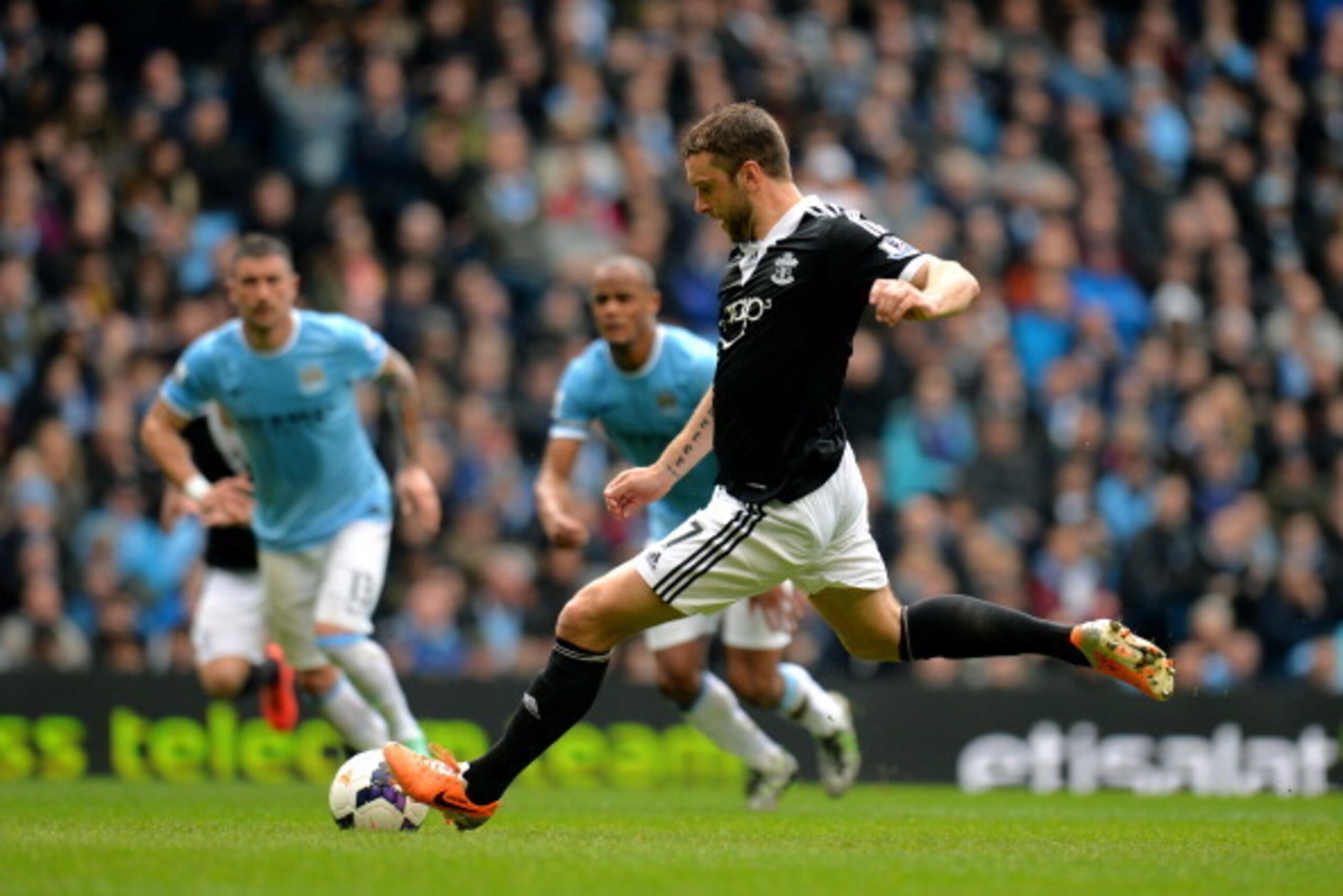 MANCHESTER, ENGLAND - APRIL 05:  Rickie Lambert scores a goal from the penalty spot to level the scores at 1-1 during the Barclays Premier League match between Manchester City and Southampton at Etihad Stadium on April 5, 2014 in Manchester, England.  (Ph