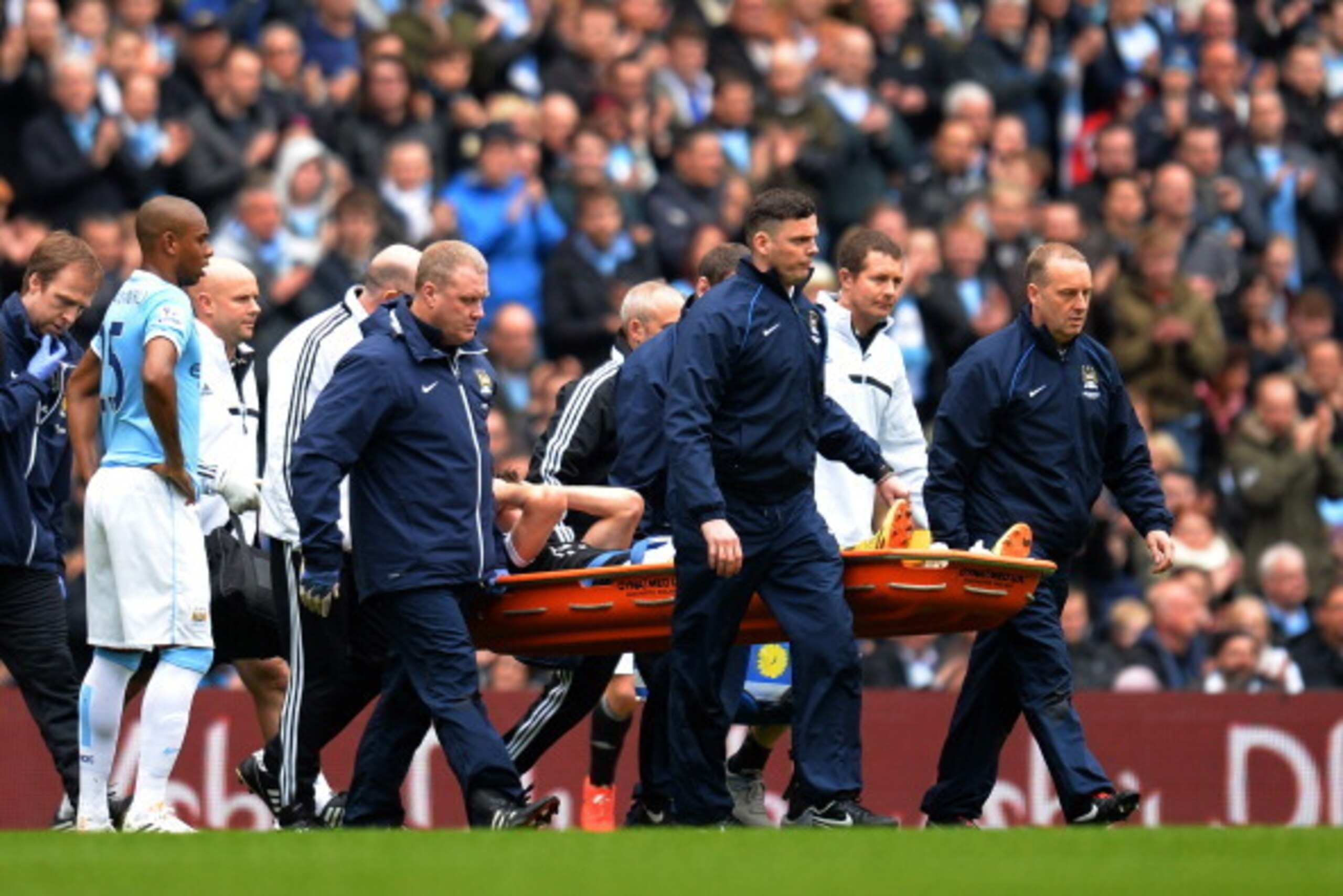 MANCHESTER, ENGLAND - APRIL 05:  The injured Jay Rodriguez of Southampton is stretchered off the pitch after landing awkwardly during the Barclays Premier League match between Manchester City and Southampton at Etihad Stadium on April 5, 2014 in Mancheste