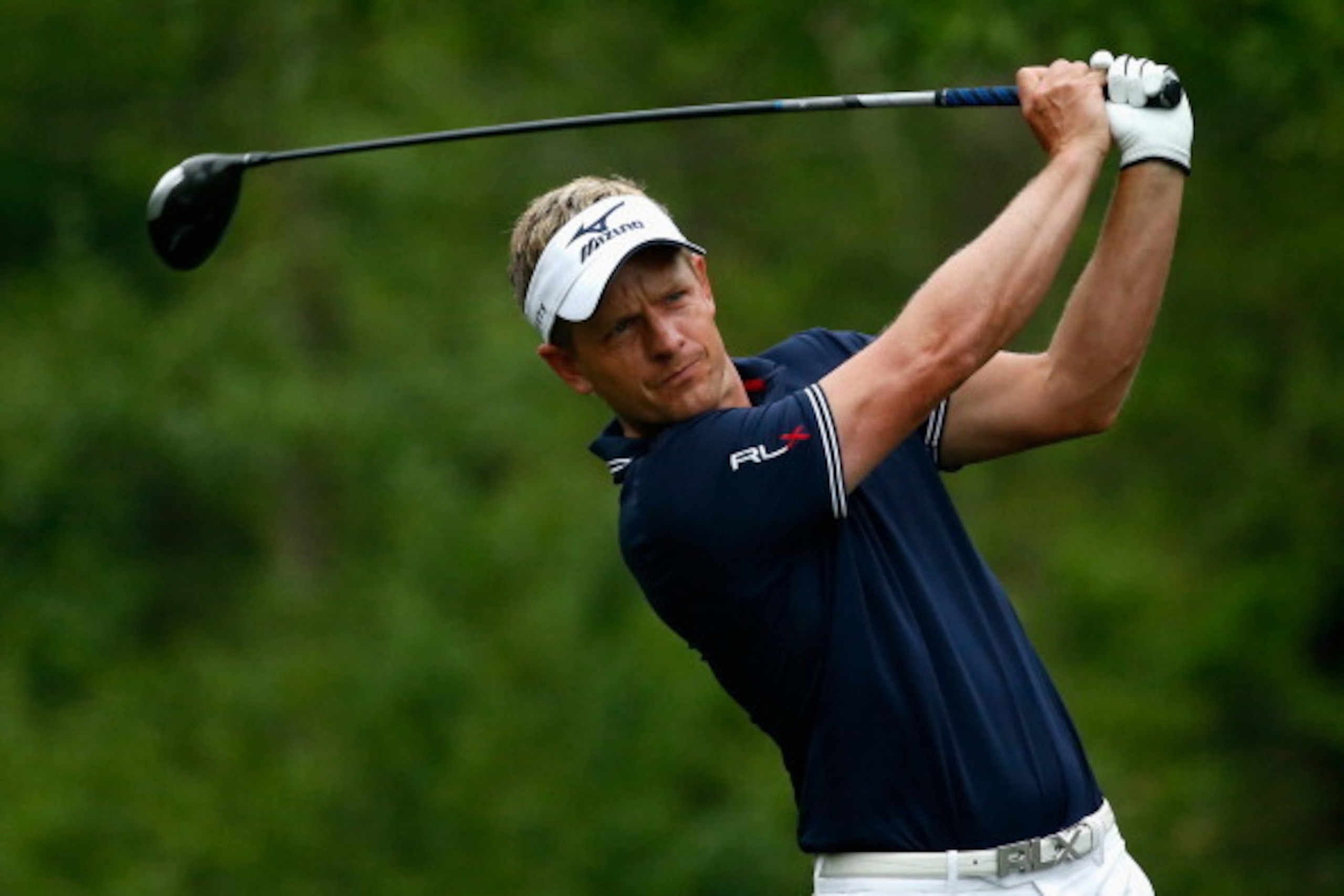 HUMBLE, TX - APRIL 02:  Luke Donald of England hits a shot during the pro-am prior to the start of the Shell Houston Open at the Golf Club of Houston on April 2, 2014 in Humble, Texas.  (Photo by Scott Halleran/Getty Images)