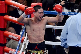 LAS VEGAS, NV - SEPTEMBER 14:  Danny Garcia celebrates after the 12th round against Lucas Matthysse in their WBC/WBA super lightweight title fight at the MGM Grand Garden Arena on September 14, 2013 in Las Vegas, Nevada.  (Photo by Ethan Miller/Getty Imag