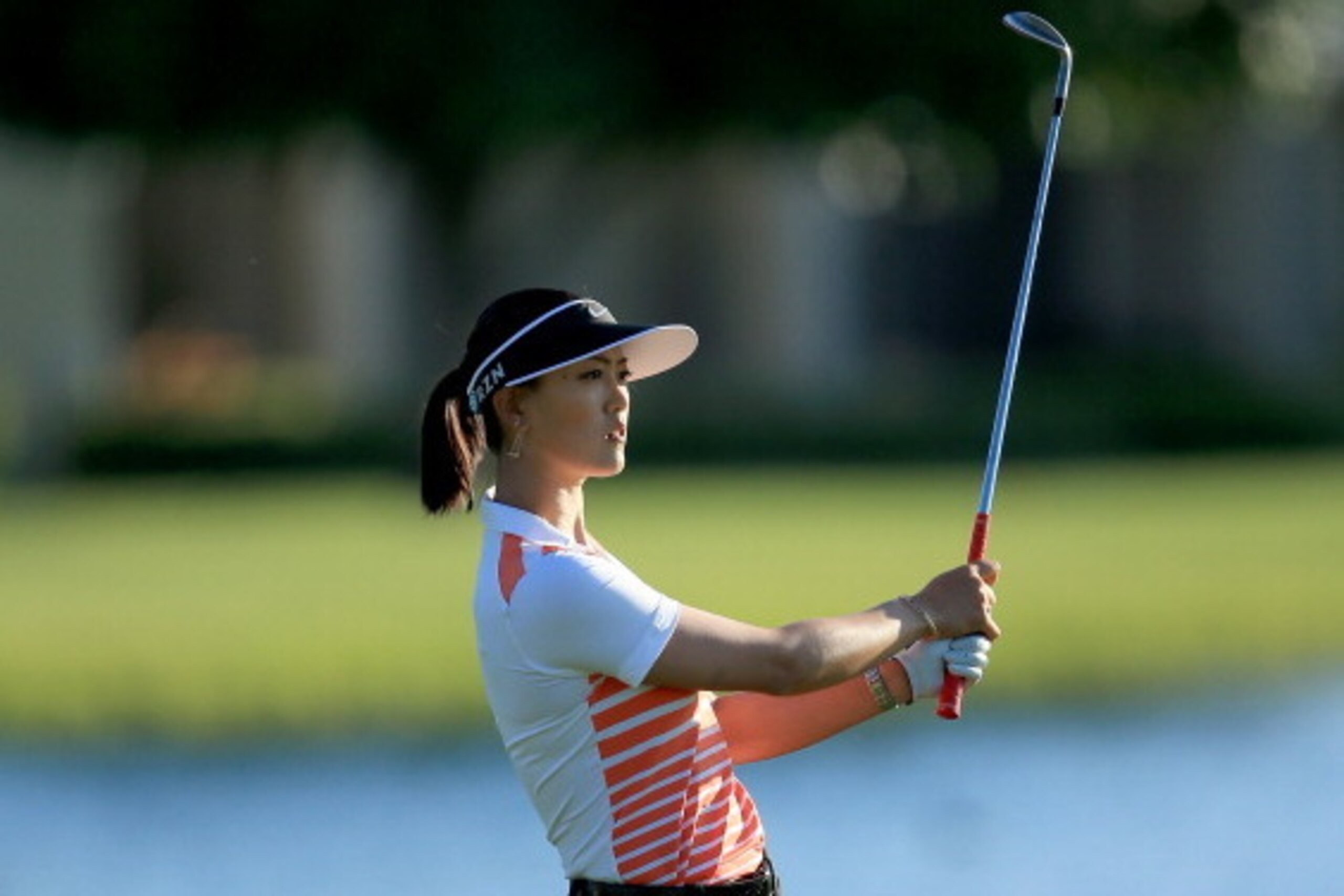 RANCHO MIRAGE, CA - APRIL 05:  Michelle Wie of the USA plays her third shot at the par 5, 18th hole during the third round of the 2014  Kraft Nabisco Championship on the Dinah Shore Tournament Course at Mission Hills Country Club on April 5, 2014 in Ranch