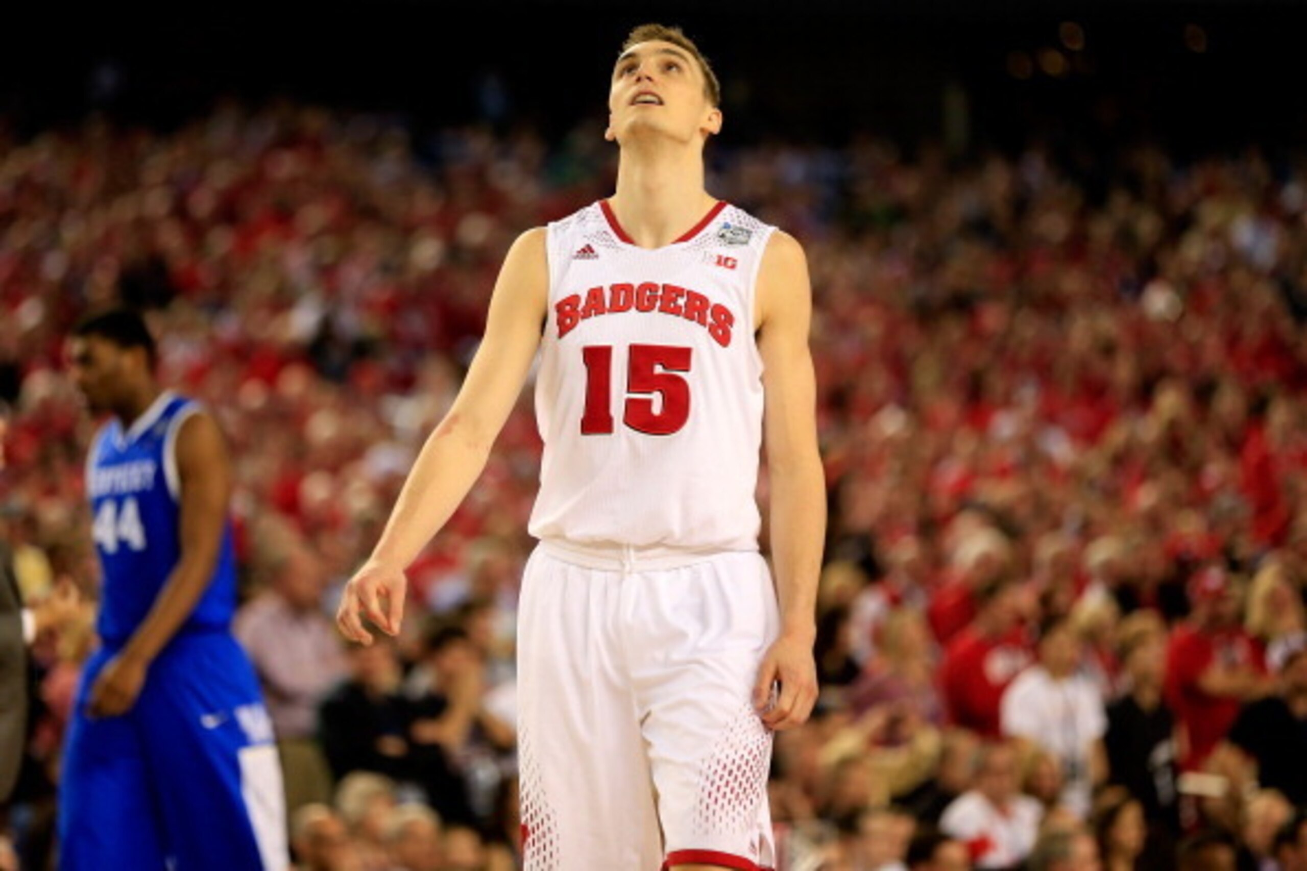 ARLINGTON, TX - APRIL 05:  Sam Dekker #15 of the Wisconsin Badgers reacts after losing to the Kentucky Wildcats 74-73 in the NCAA Men's Final Four Semifinal at AT&T Stadium on April 5, 2014 in Arlington, Texas.  (Photo by Jamie Squire/Getty Images)