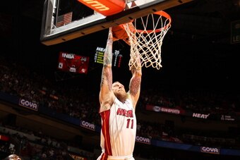 MIAMI, FL - March 14: Chris Andersen #11 of the Miami Heat goes up for a dunk against the Denver Nuggets at the American Airlines Arena in Miami, Florida on March 14 2014. NOTE TO USER: User expressly acknowledges and agrees that, by downloading and/or us