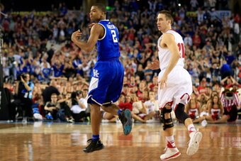 ARLINGTON, TX - APRIL 05:  Aaron Harrison #2 of the Kentucky Wildcats reacts after hitting the game winning shot to defeat the Wisconsin Badgers 74-73 in the NCAA Men's Final Four Semifinal at AT&T Stadium on April 5, 2014 in Arlington, Texas.  (Photo by 