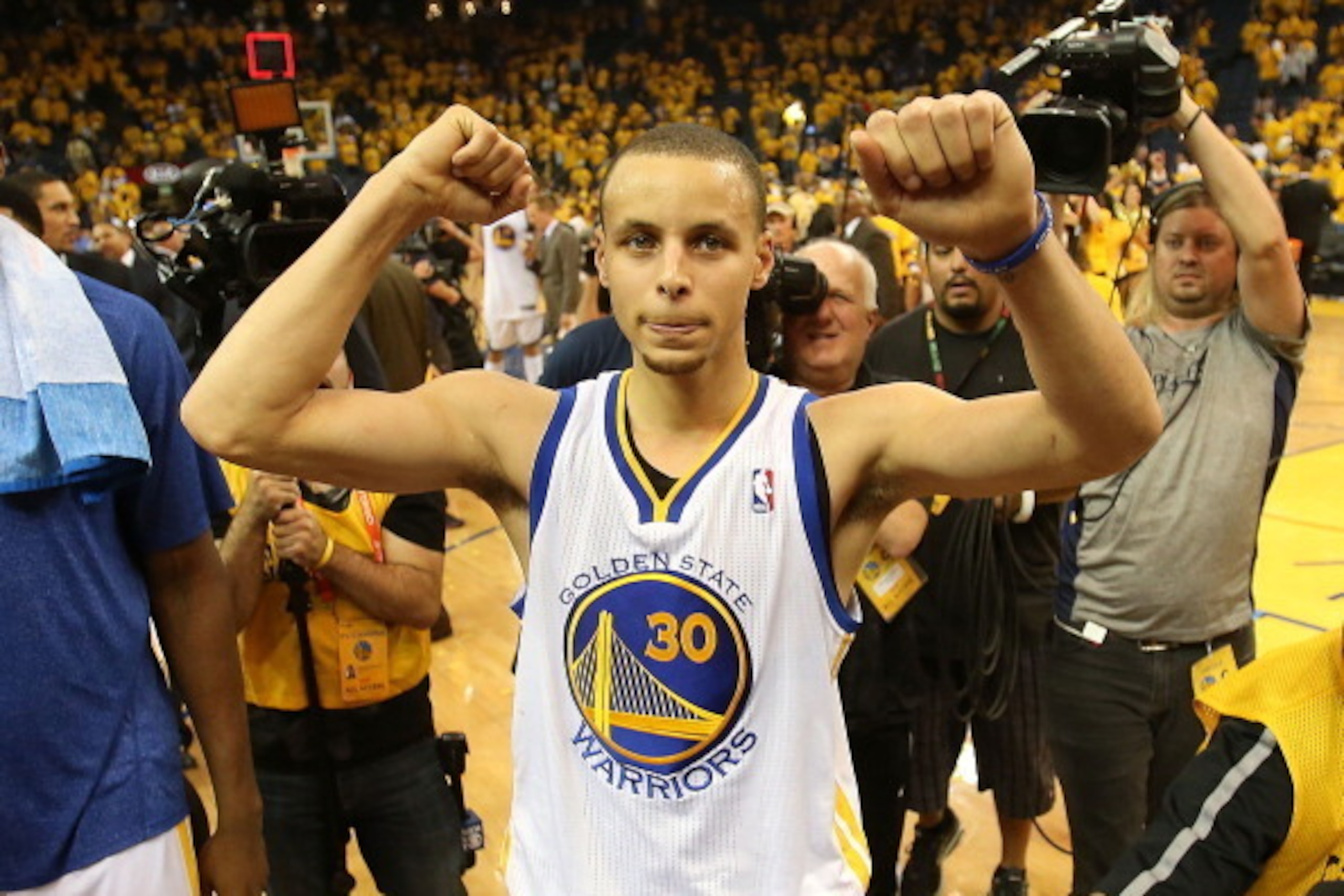 OAKLAND, CA - MAY 02:  Stephen Curry #30 of the Golden State Warriors celebrates after defeating the Denver Nuggets during Game Six of the Western Conference Quarterfinals of the 2013 NBA Playoffs at ORACLE Arena on May 2, 2013 in Oakland, California. NOT