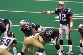 03 Feb 2002:   Quarterback Tom Brady #12 of the New England Patriots signals against the St.Louis Rams during Superbowl XXXVI at the Superdome in New Orleans, Louisiana.  The Patriots defeated the Rams 20-17. DIGITAL IMAGE. Mandatory Credit: Ronald Martin