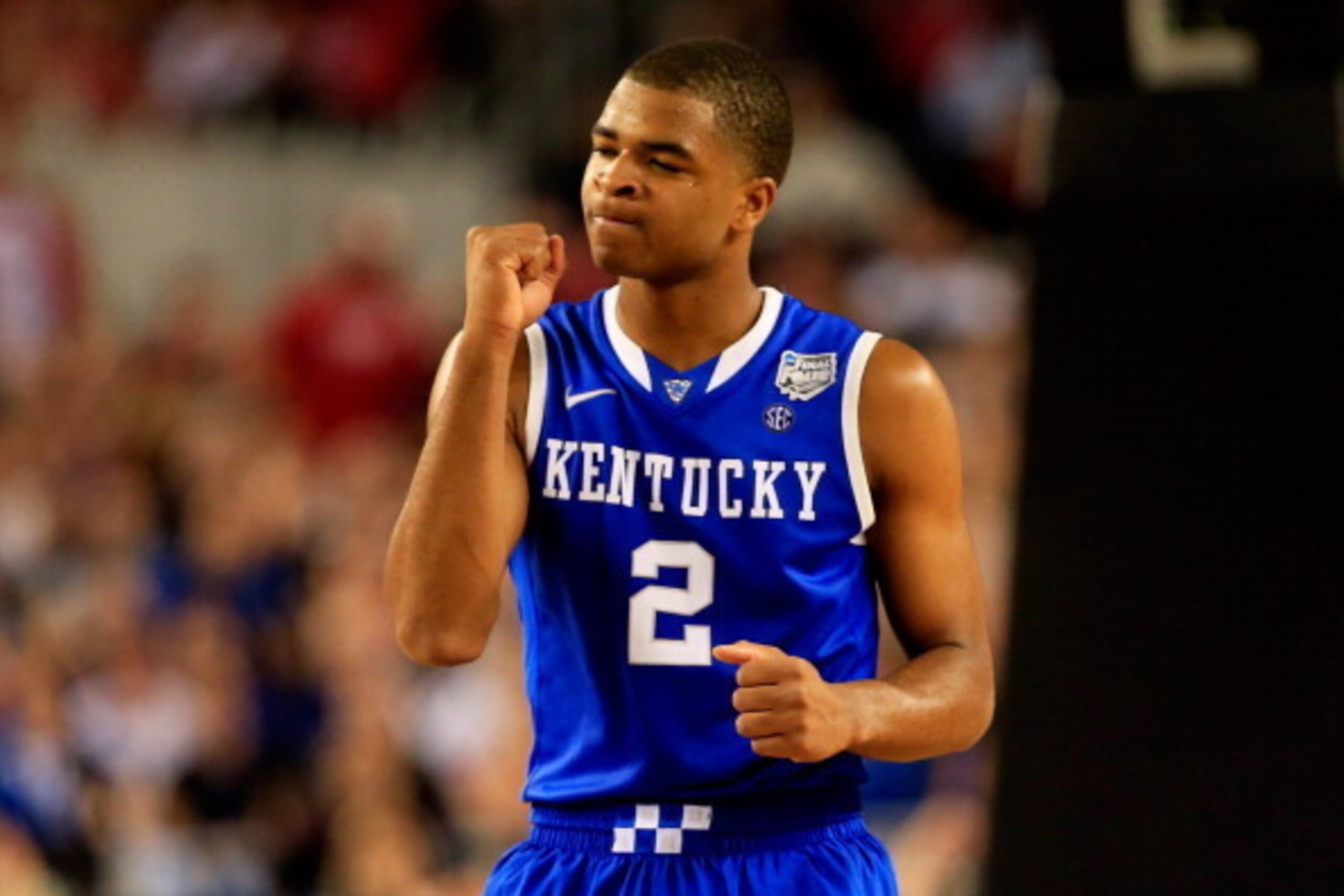 ARLINGTON, TX - APRIL 05: Aaron Harrison #2 of the Kentucky Wildcats reacts during the NCAA Men's Final Four Semifinal against the Wisconsin Badgers at AT&T Stadium on April 5, 2014 in Arlington, Texas.  (Photo by Jamie Squire/Getty Images)
