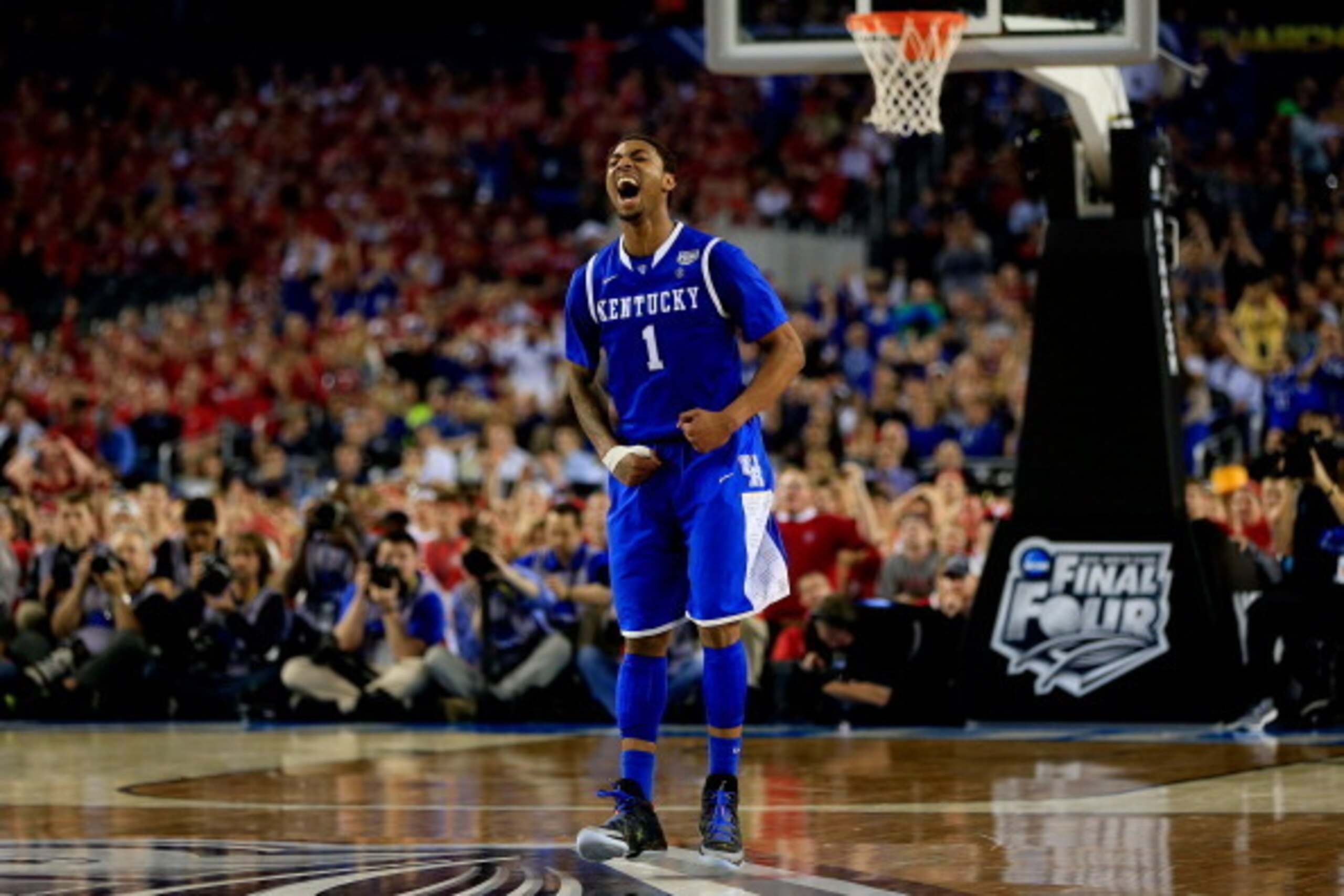 ARLINGTON, TX - APRIL 05: James Young #1 of the Kentucky Wildcats reacts during the NCAA Men's Final Four Semifinal against the Wisconsin Badgers at AT&T Stadium on April 5, 2014 in Arlington, Texas.  (Photo by Jamie Squire/Getty Images)