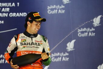 SAKHIR, BAHRAIN - APRIL 06:  Sergio Perez of Mexico and Force India celebrates finishing third during the Bahrain Formula One Grand Prix at the Bahrain International Circuit on April 6, 2014 in Sakhir, Bahrain.  (Photo by Mark Thompson/Getty Images)