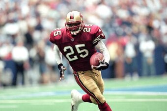 24 Sep 2000:  Charlie Garner #25 of the San Francisco 49ers runs with the ball during the game against the Dallas Cowboys at the Texas Stadium in Irving, Texas. The 49ers defeated the Cowboys 41-24.Mandatory Credit: Ronald Martinez  /Allsport